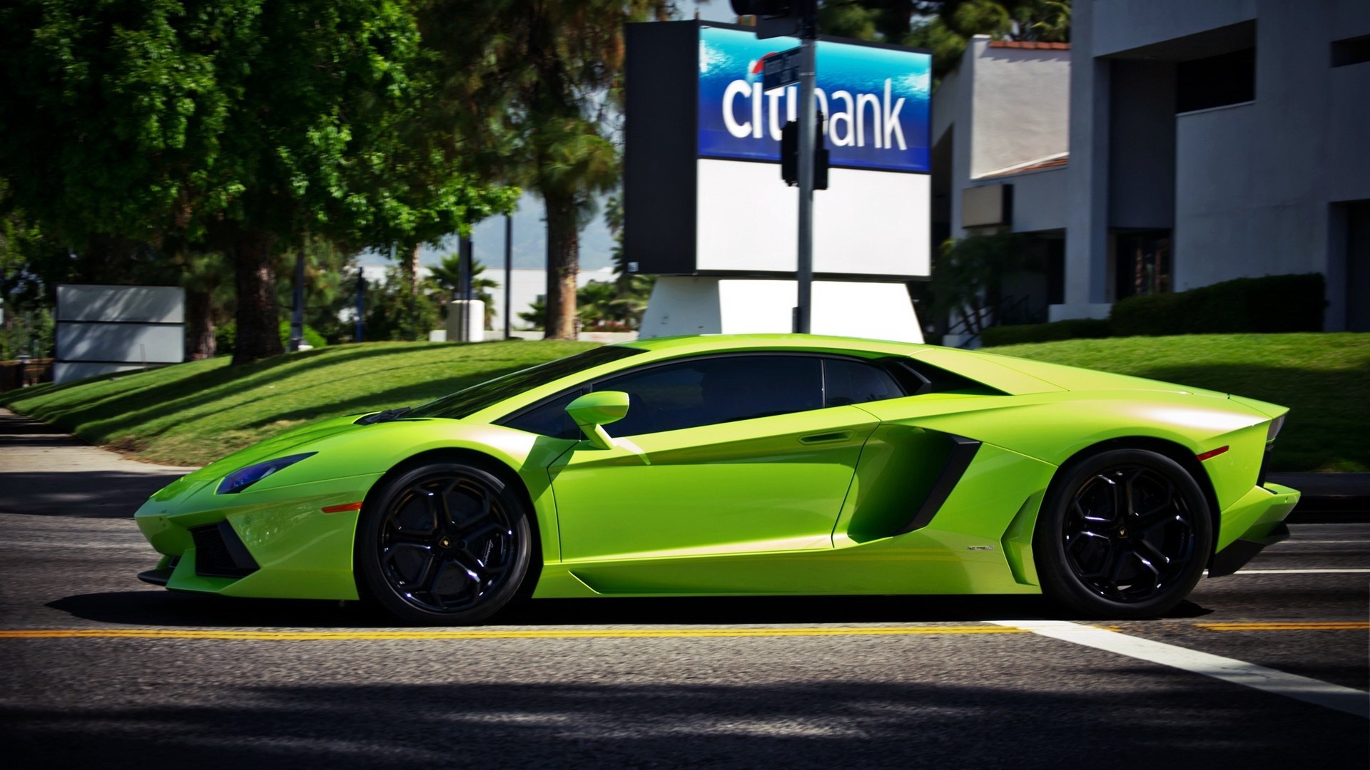 Lime Green Lamborghini Aventador driving on road HD Wallpaper