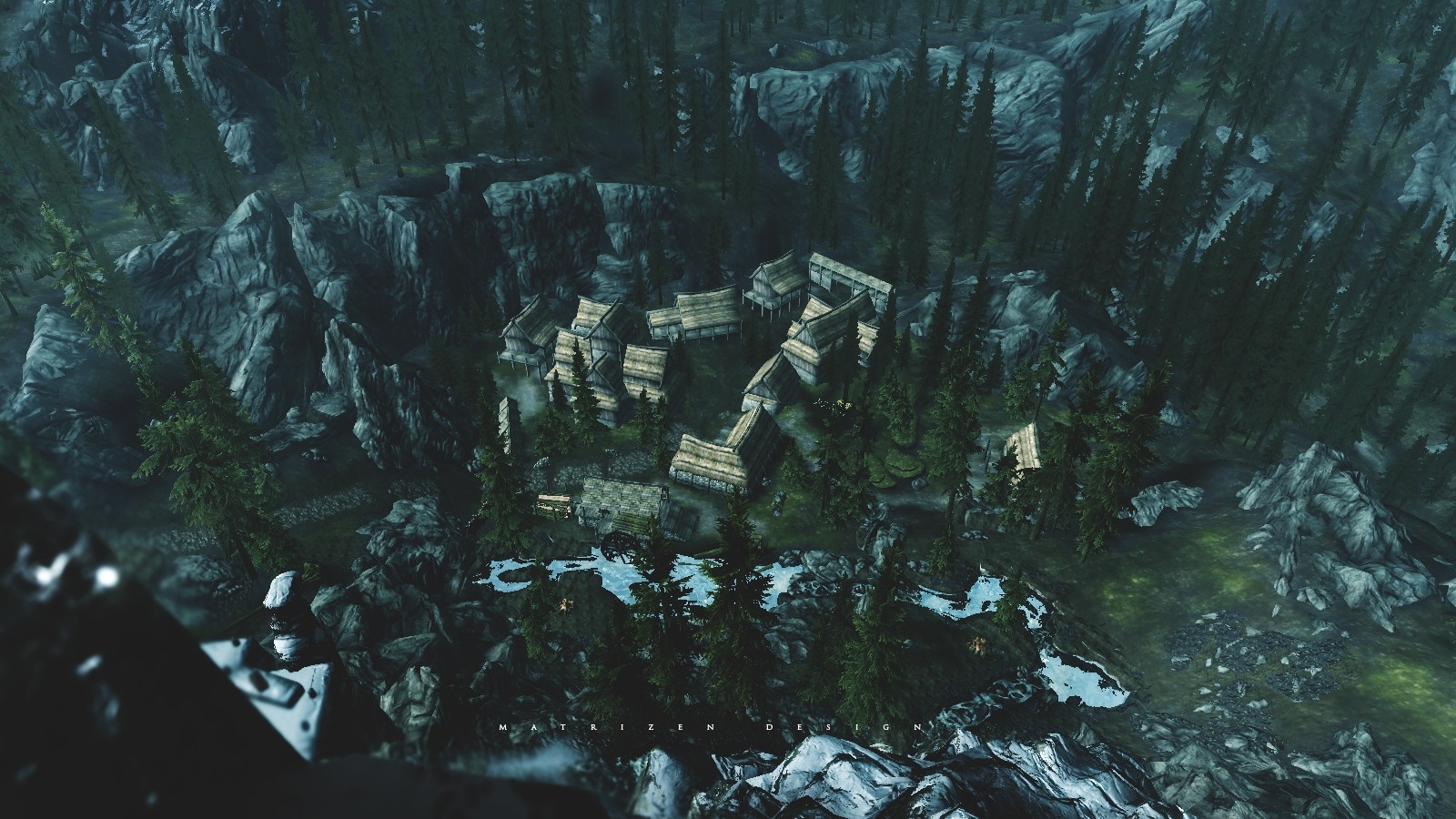 Aerial view of a village in a forest with mountains HD Wallpaper