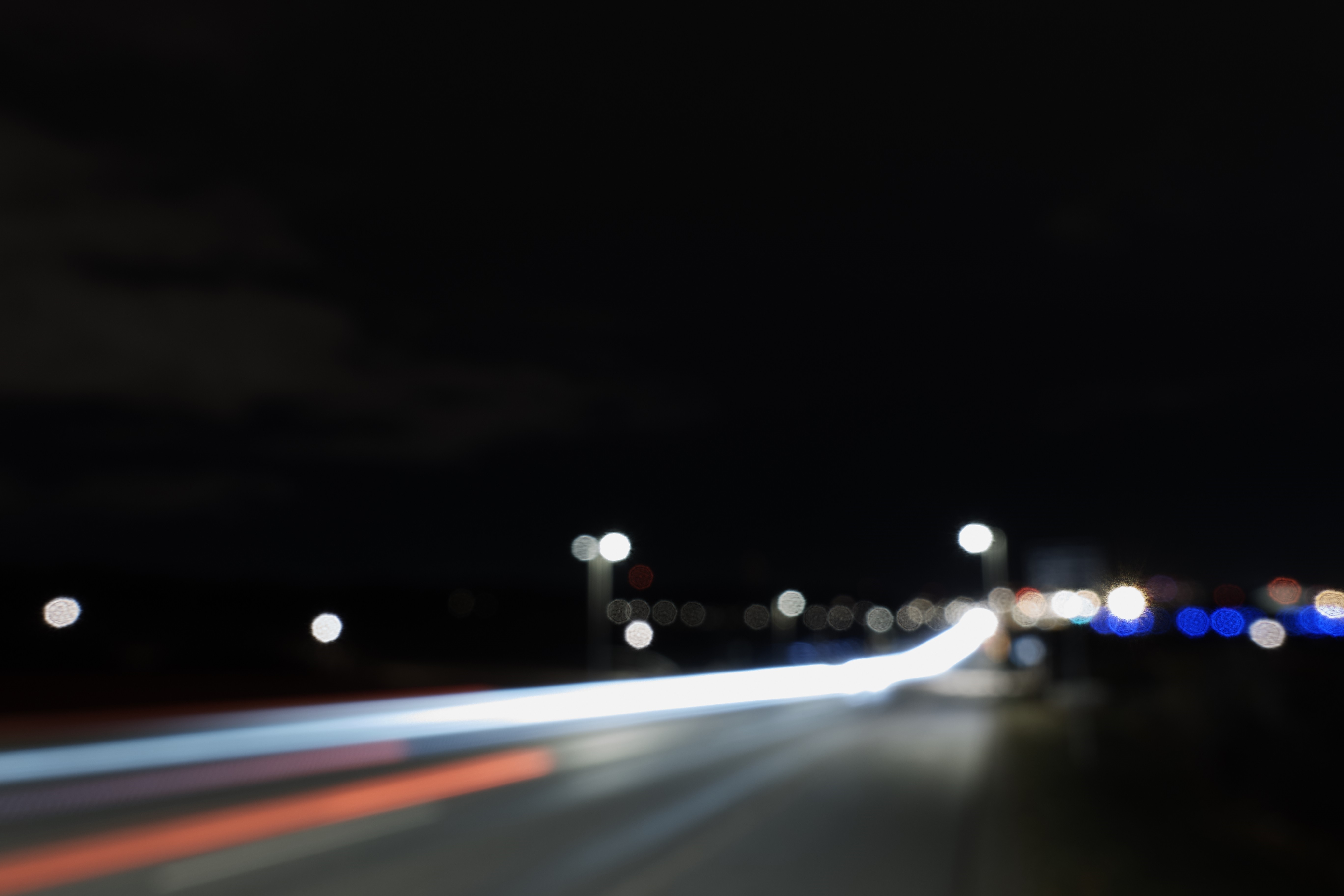 Long exposure of city lights at night HD Wallpaper