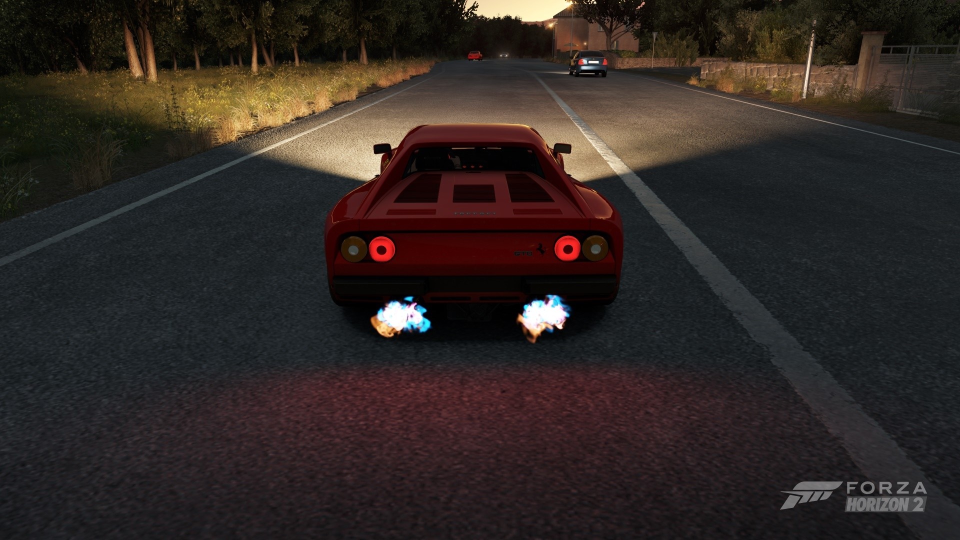 Red Ferrari GTO with flames from exhaust in Forza Horizon 2 HD Wallpaper