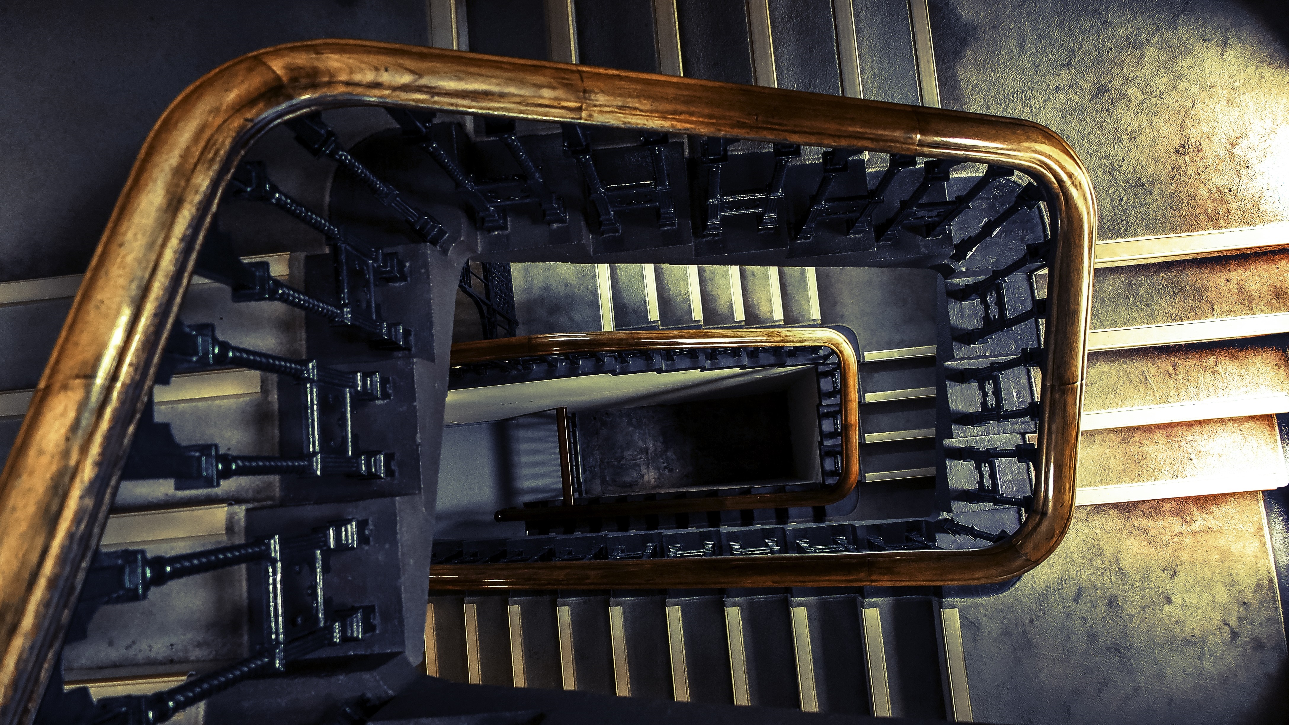 Spiral staircase with wooden handrail HD Wallpaper