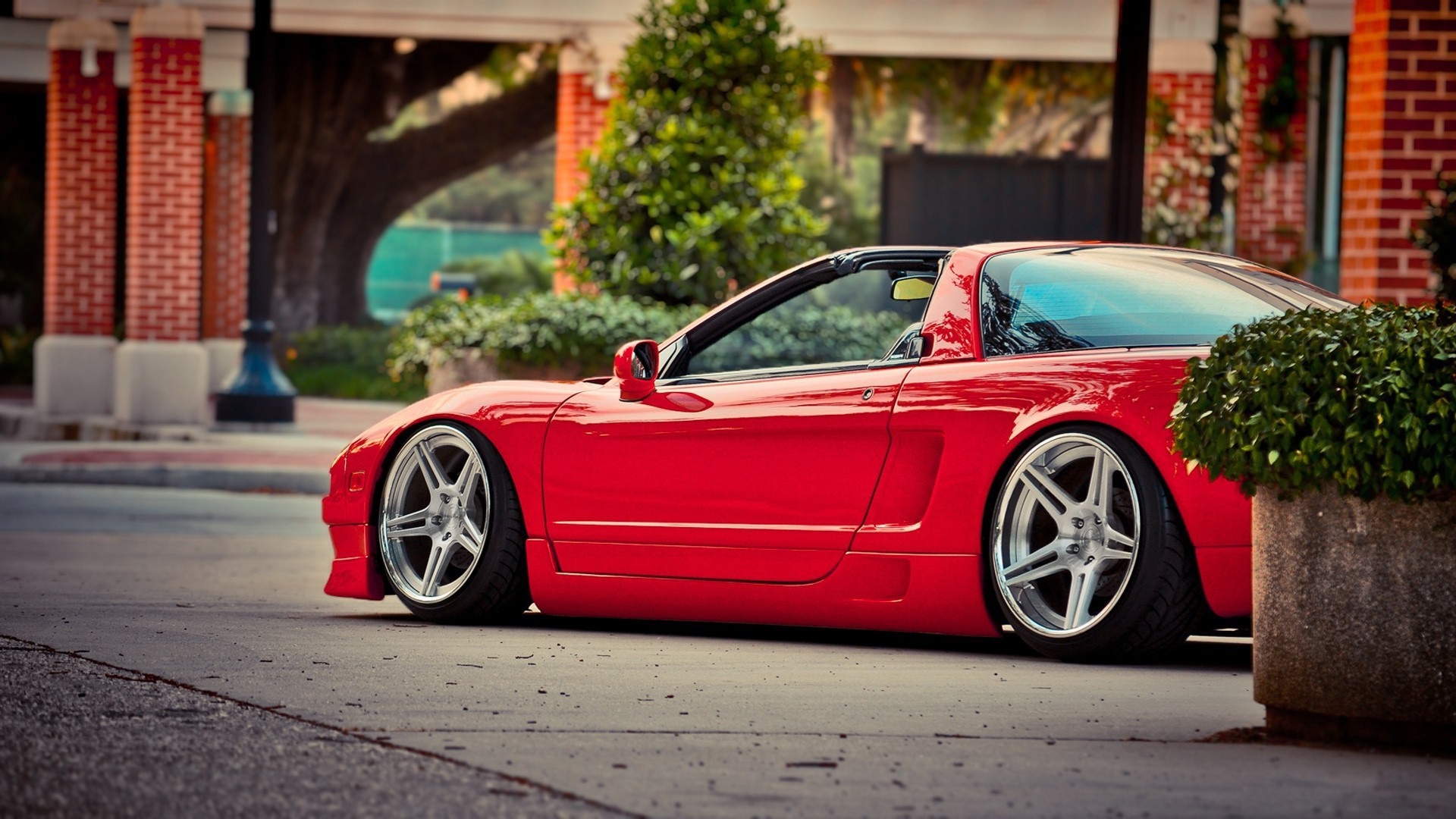Red Honda NSX sports car on a street HD Wallpaper