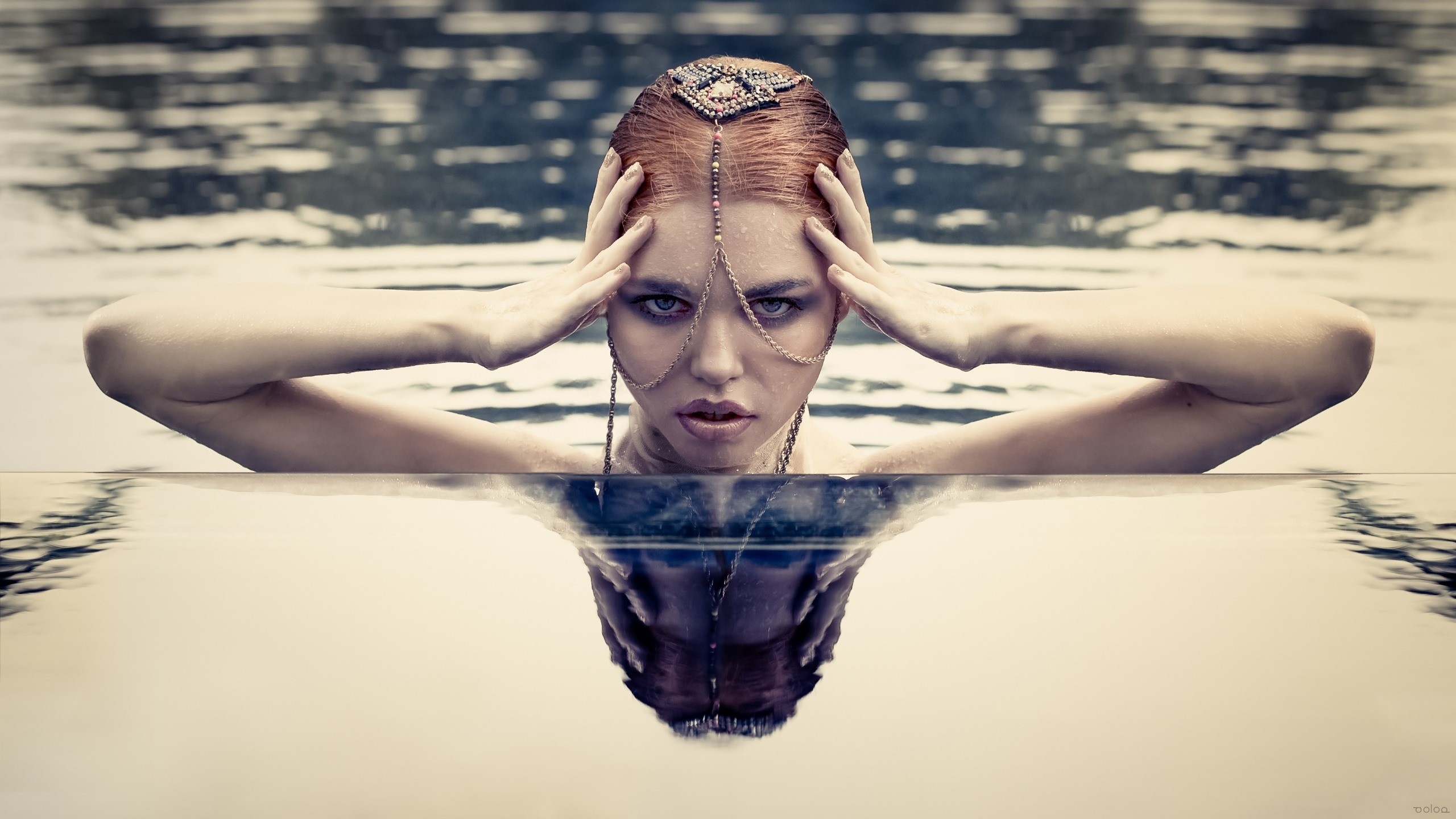 Woman with headpiece in water with reflection HD Wallpaper