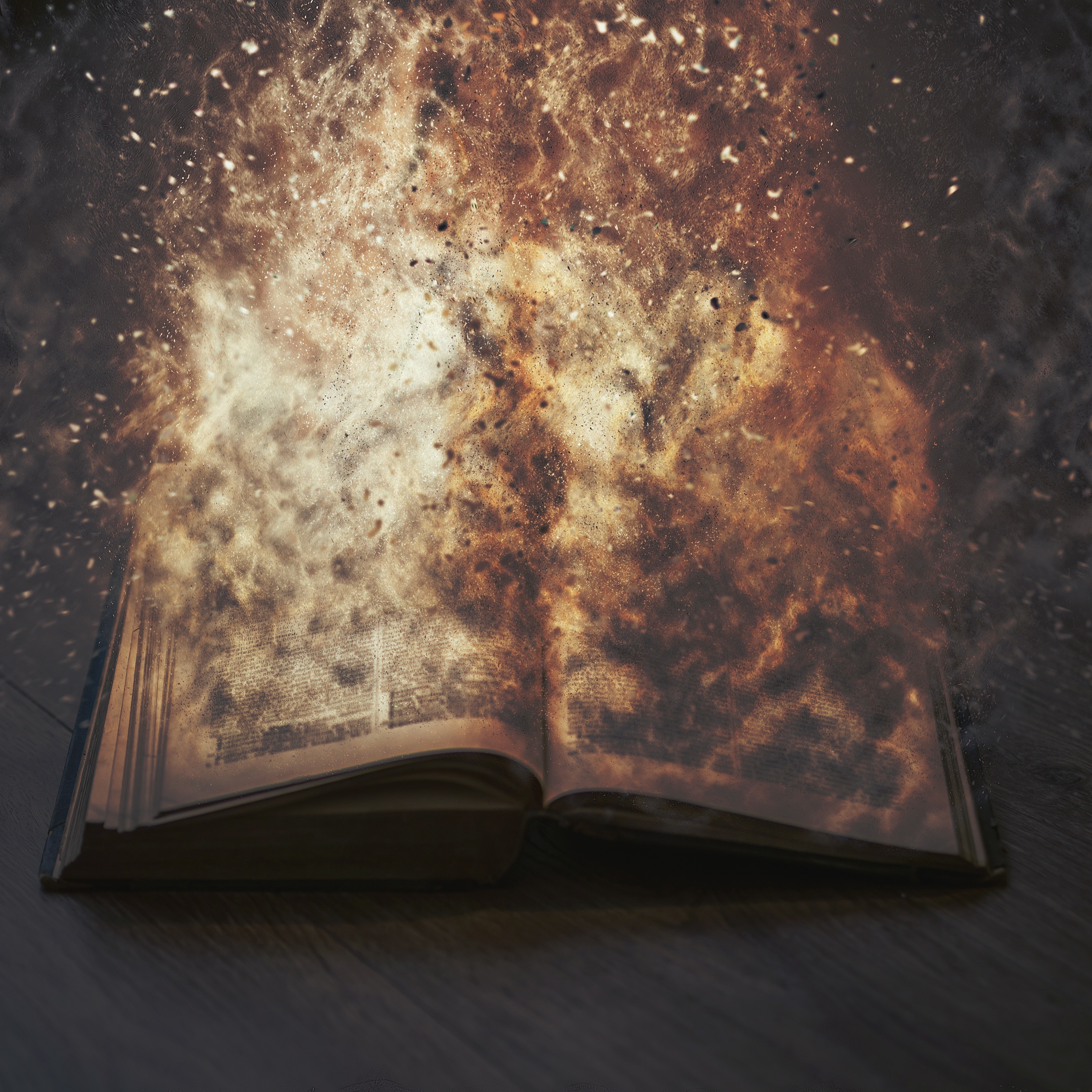 Open book exploding into cosmic dust and fire HD Wallpaper