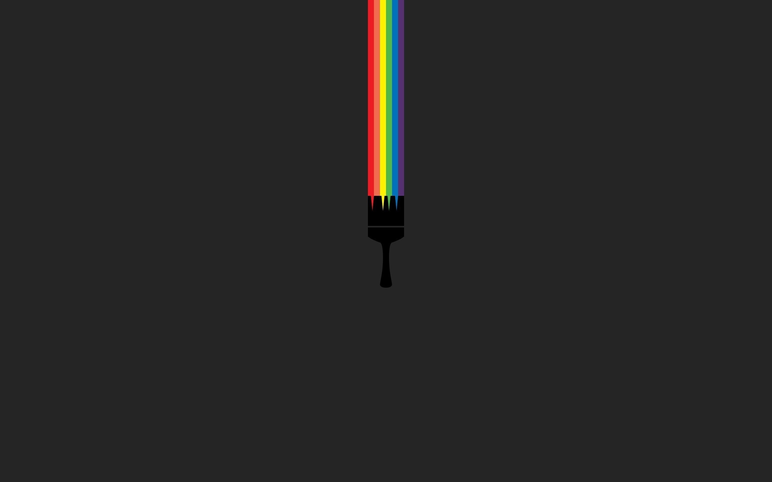 Paintbrush with rainbow colors on black background HD Wallpaper