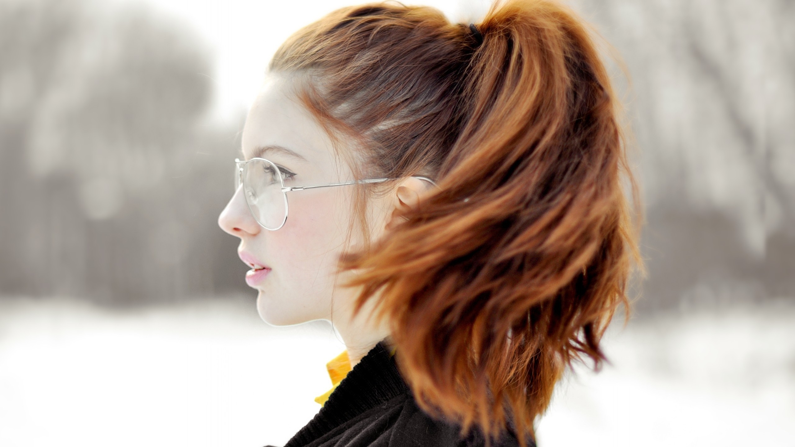 Woman with red hair and glasses in profile HD Wallpaper