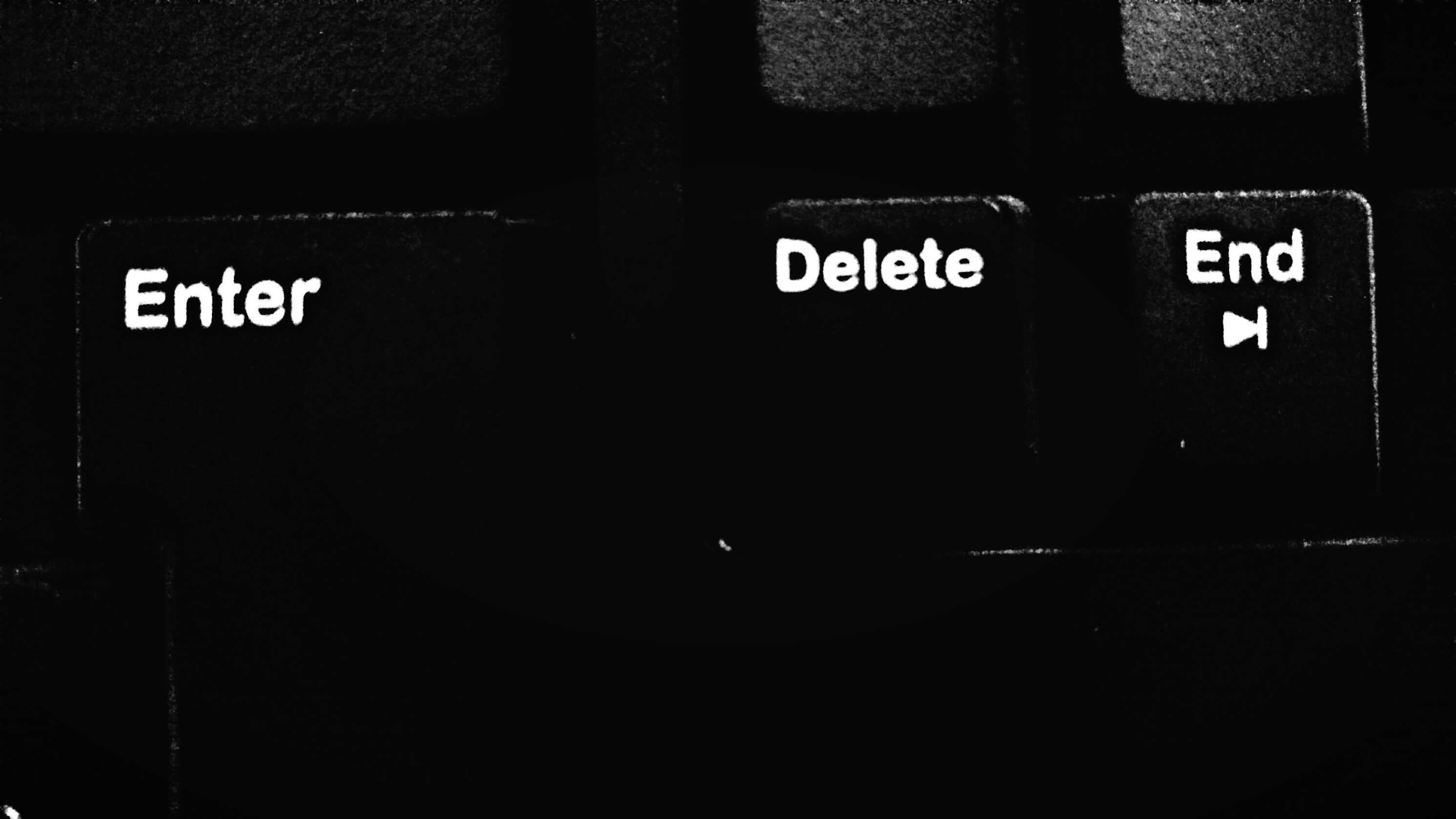 Close-up of computer keyboard keys: Enter, Delete, End HD Wallpaper