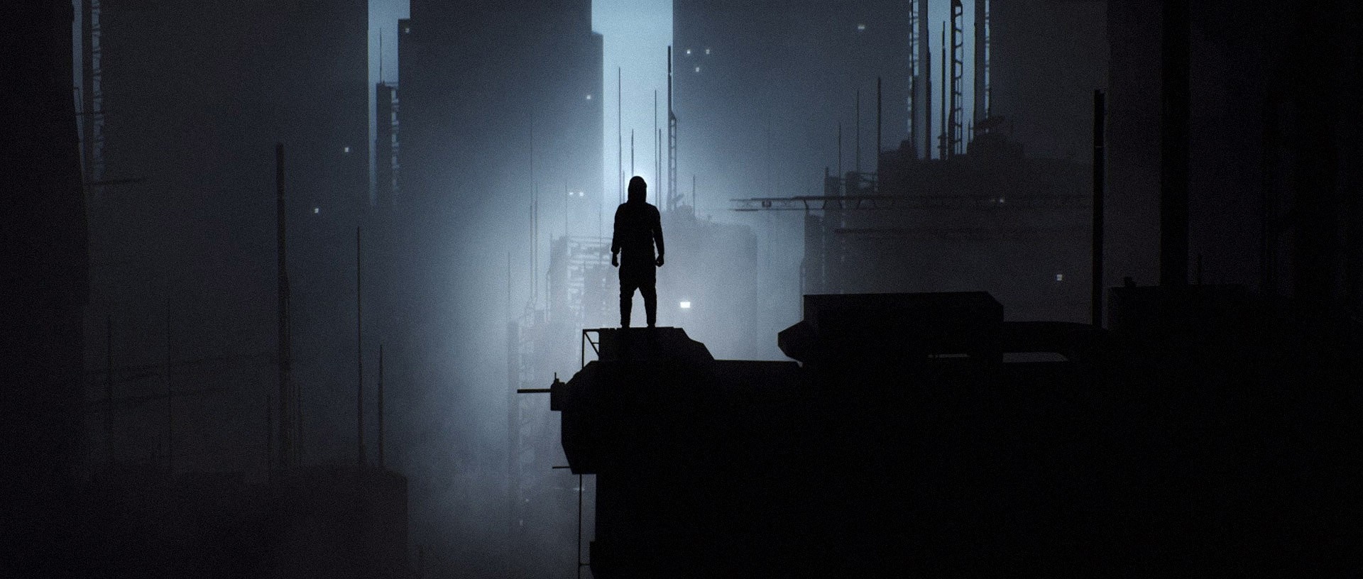 Silhouette of a person standing on a rooftop in a foggy city at night HD Wallpaper