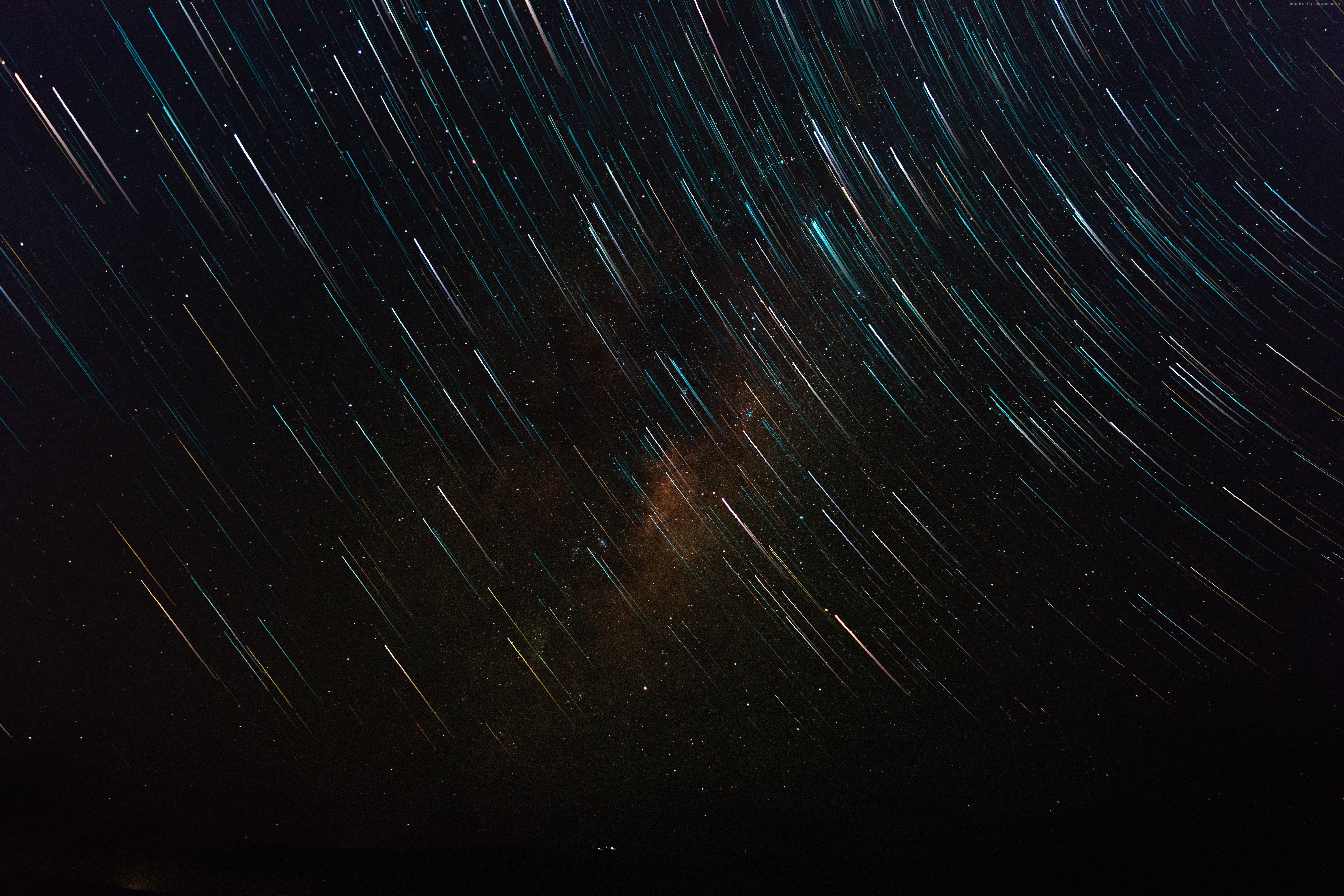 Star trails and galaxy in the night sky HD Wallpaper