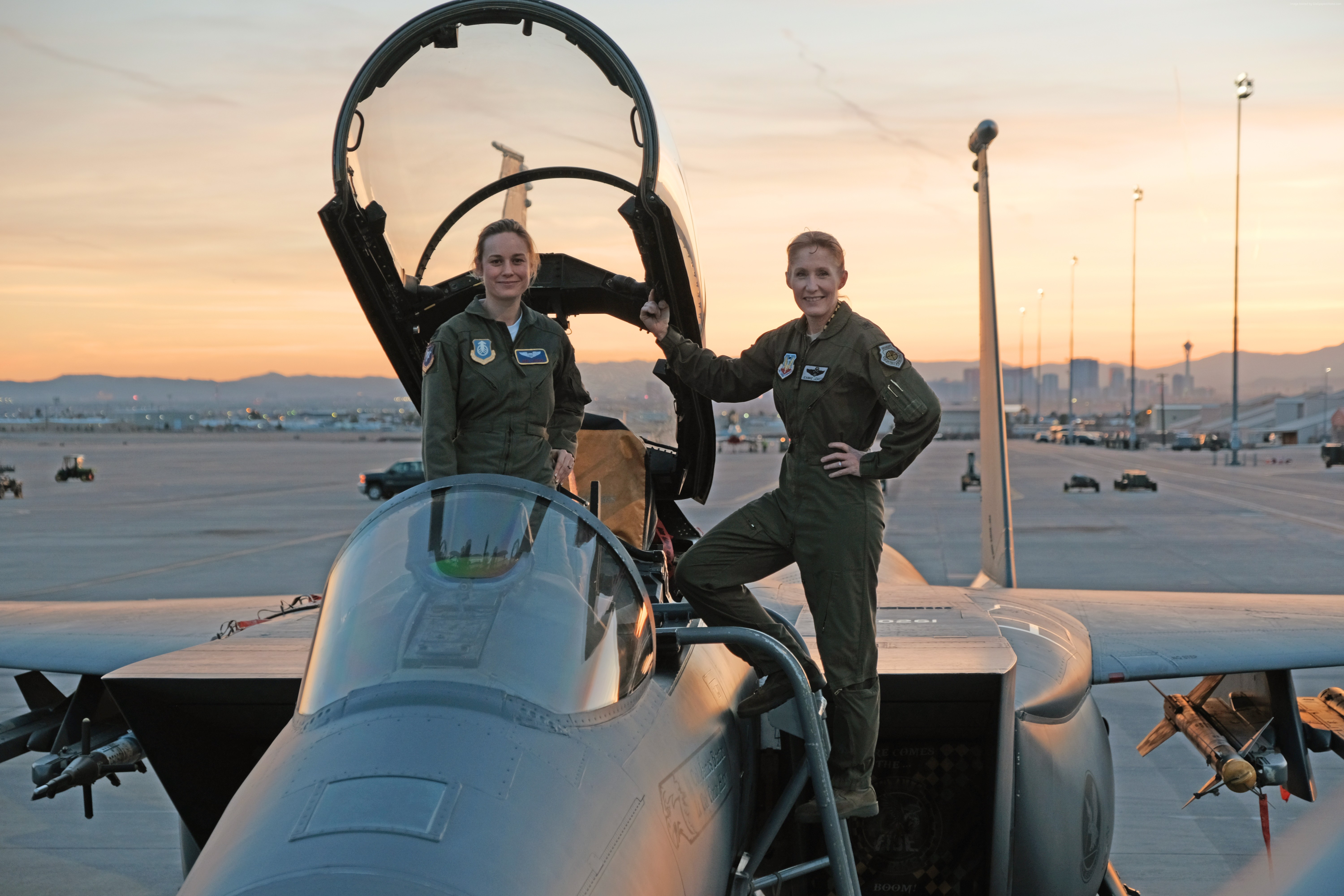Brie Larson and another woman in fighter jet HD Wallpaper