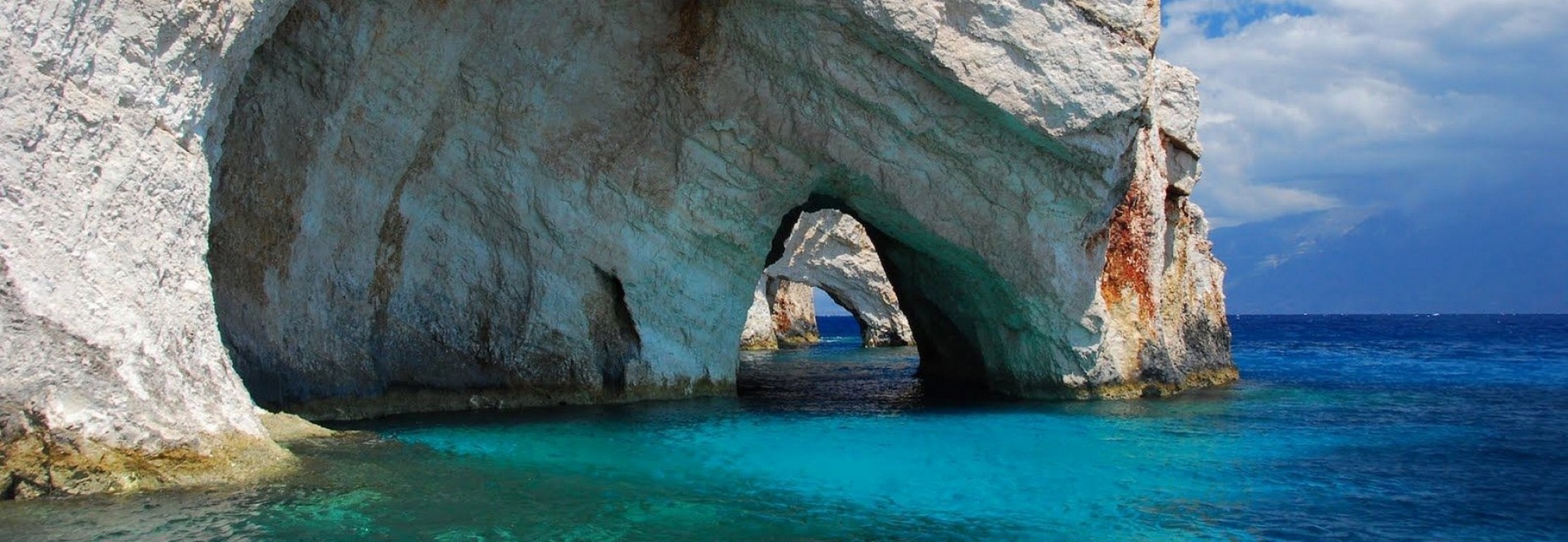 Sea caves and natural arch in Zakynthos, Greece HD Wallpaper