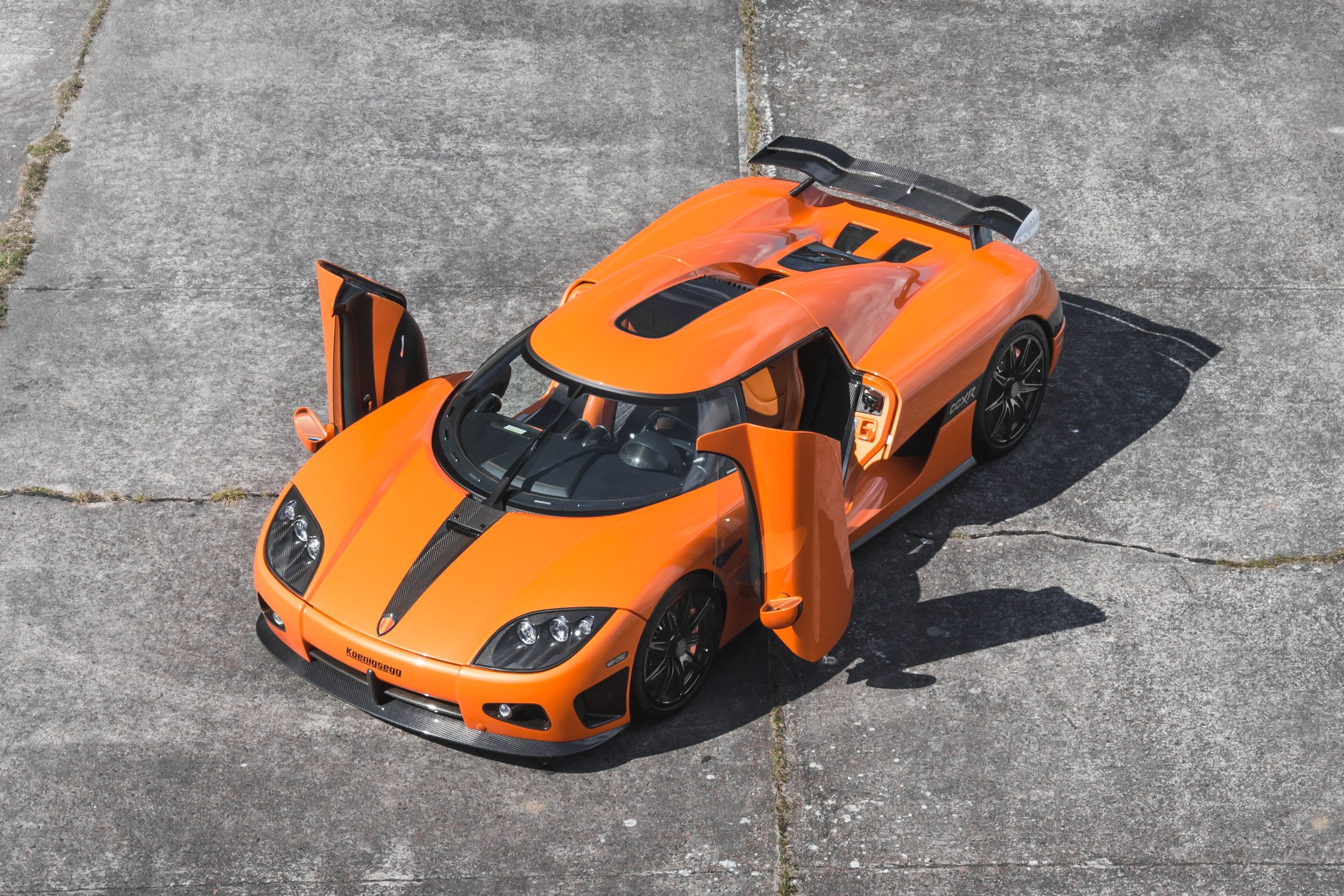 Orange Koenigsegg Agera RS with doors open HD Wallpaper