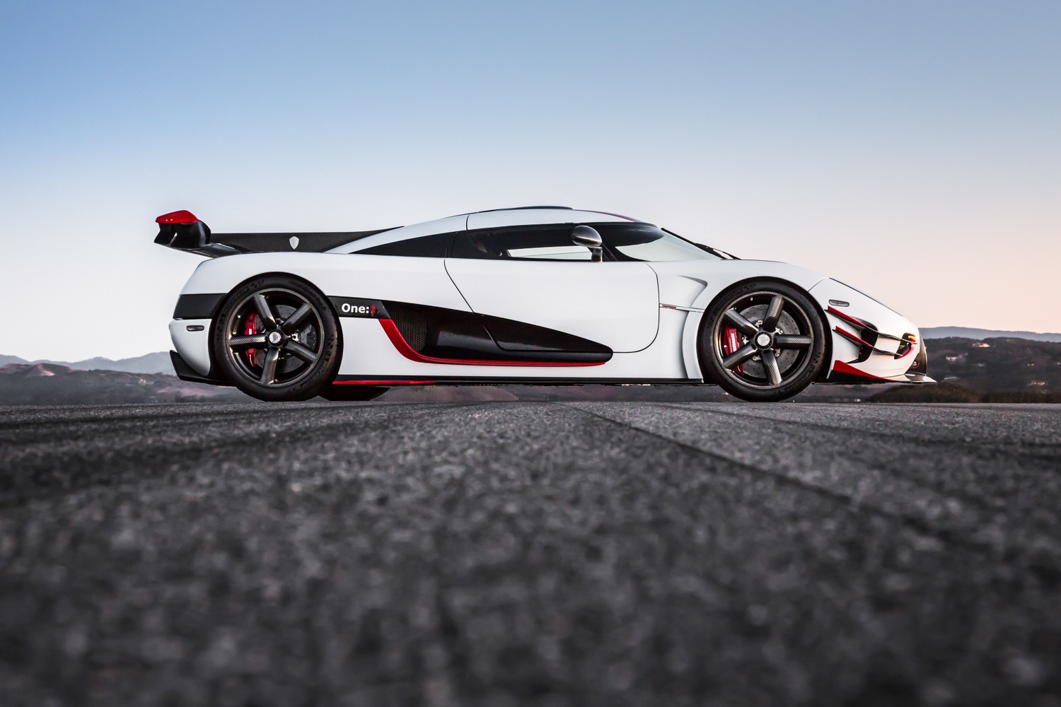 White Koenigsegg One:1 supercar with red accents HD Wallpaper