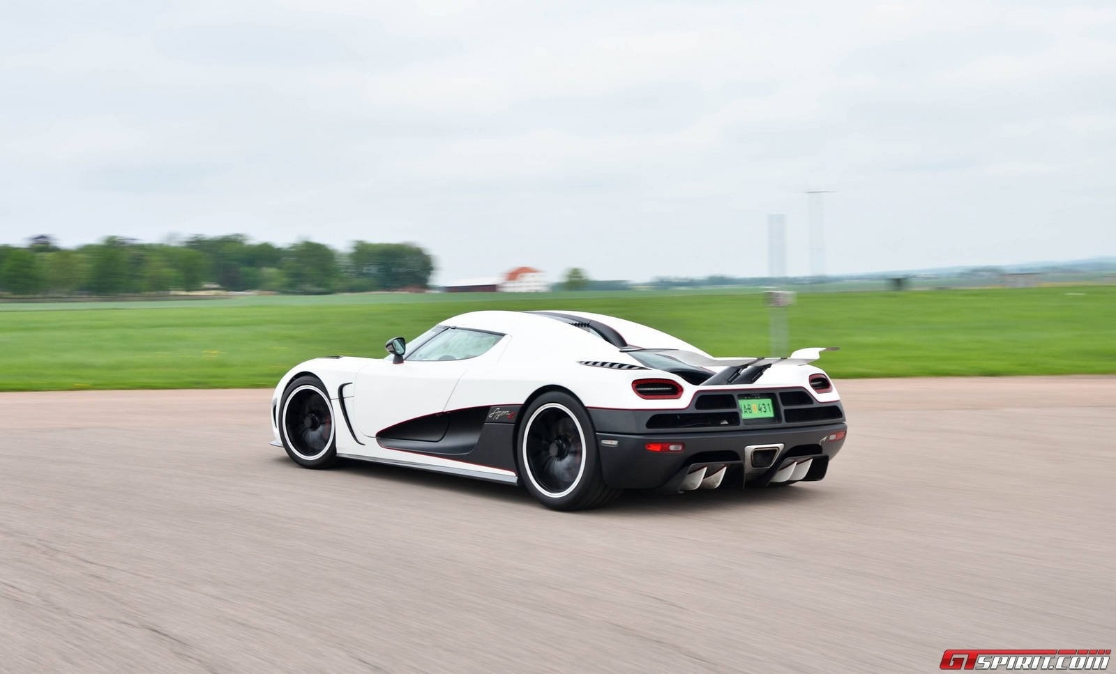 White Koenigsegg Agera RS on a Race Track HD Wallpaper