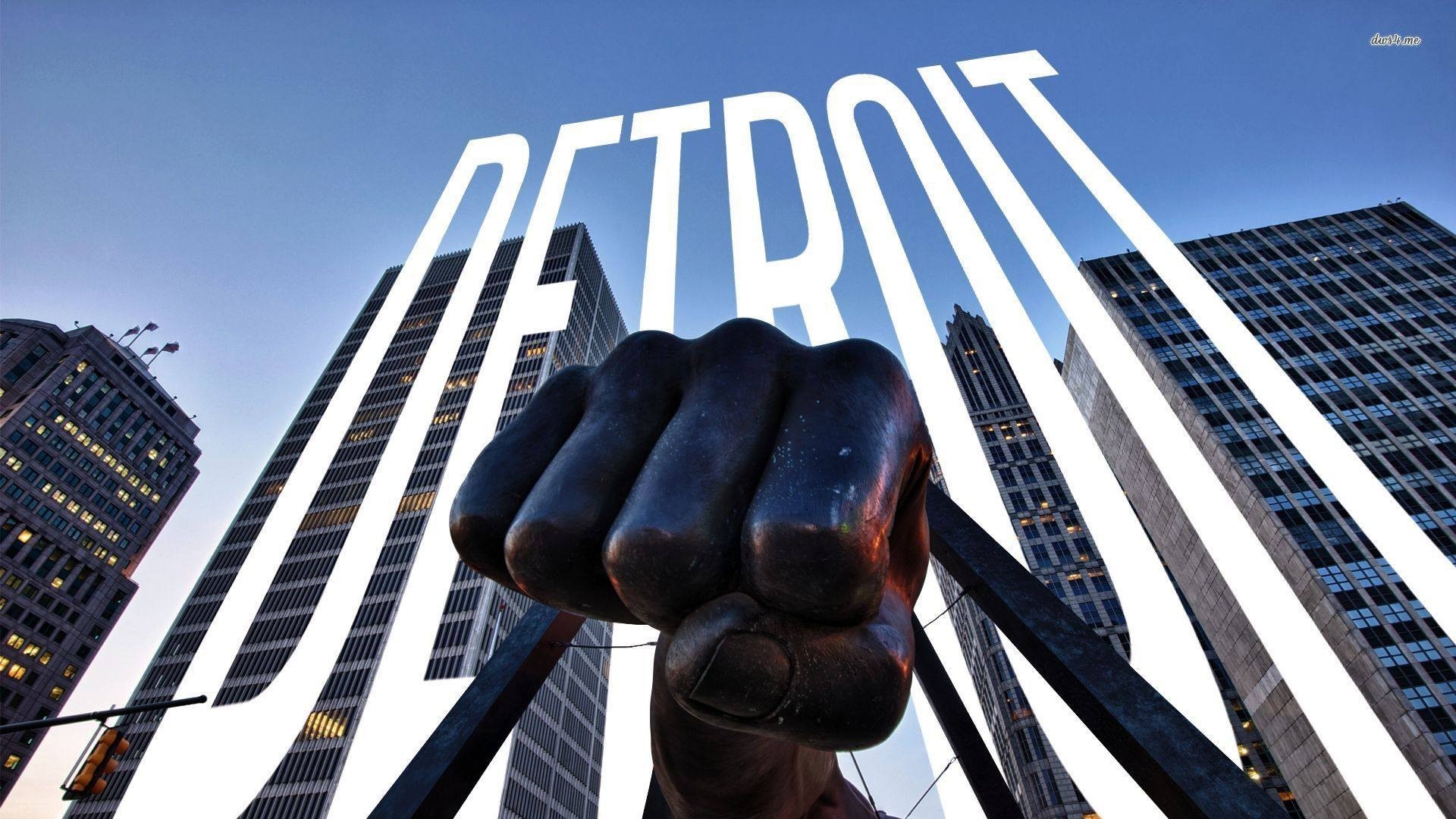 Detroit Fist Sculpture and Skyscrapers HD Wallpaper