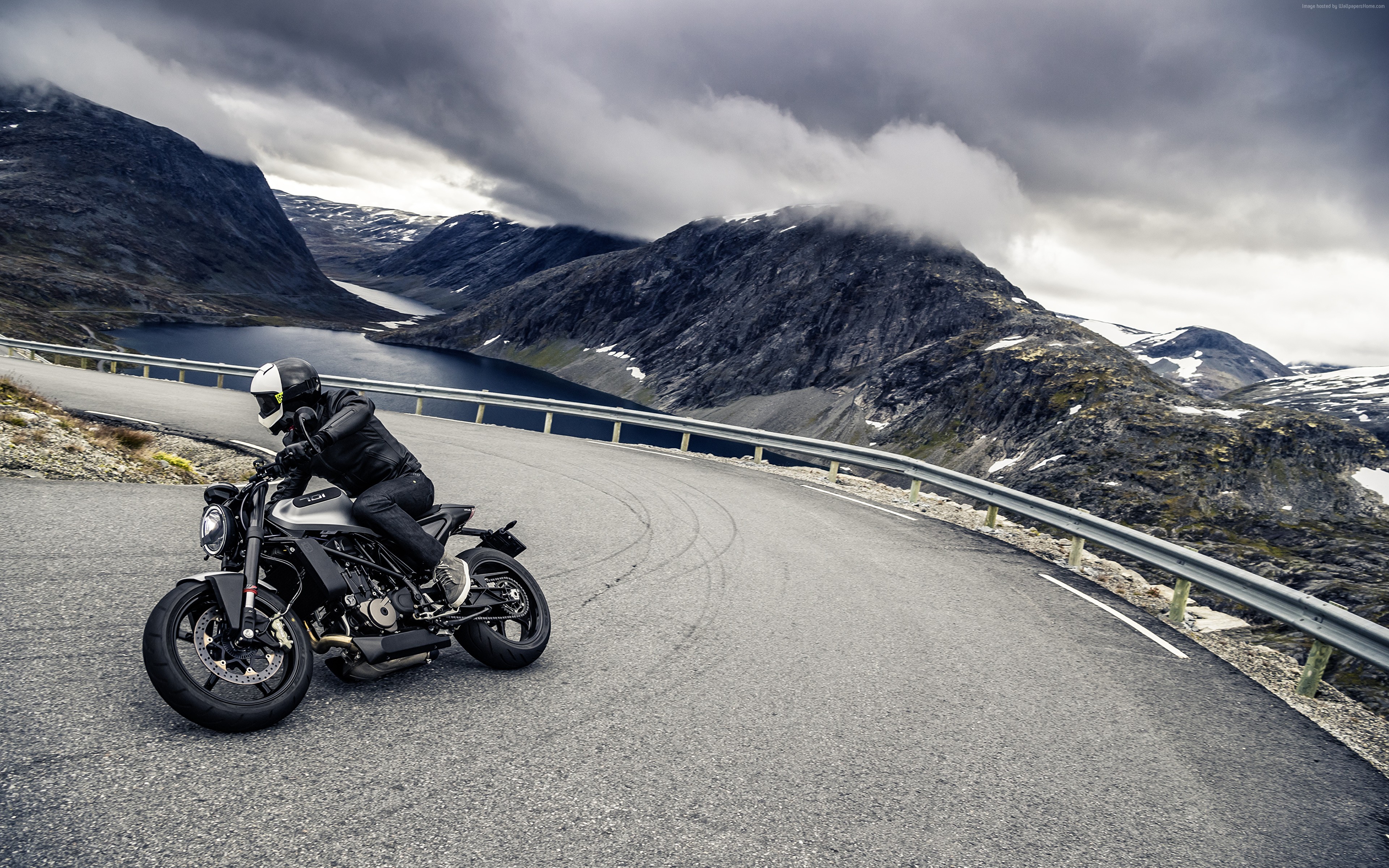 4K Husqvarna Vitpilen 701 motorcycle on mountain road HD Wallpaper