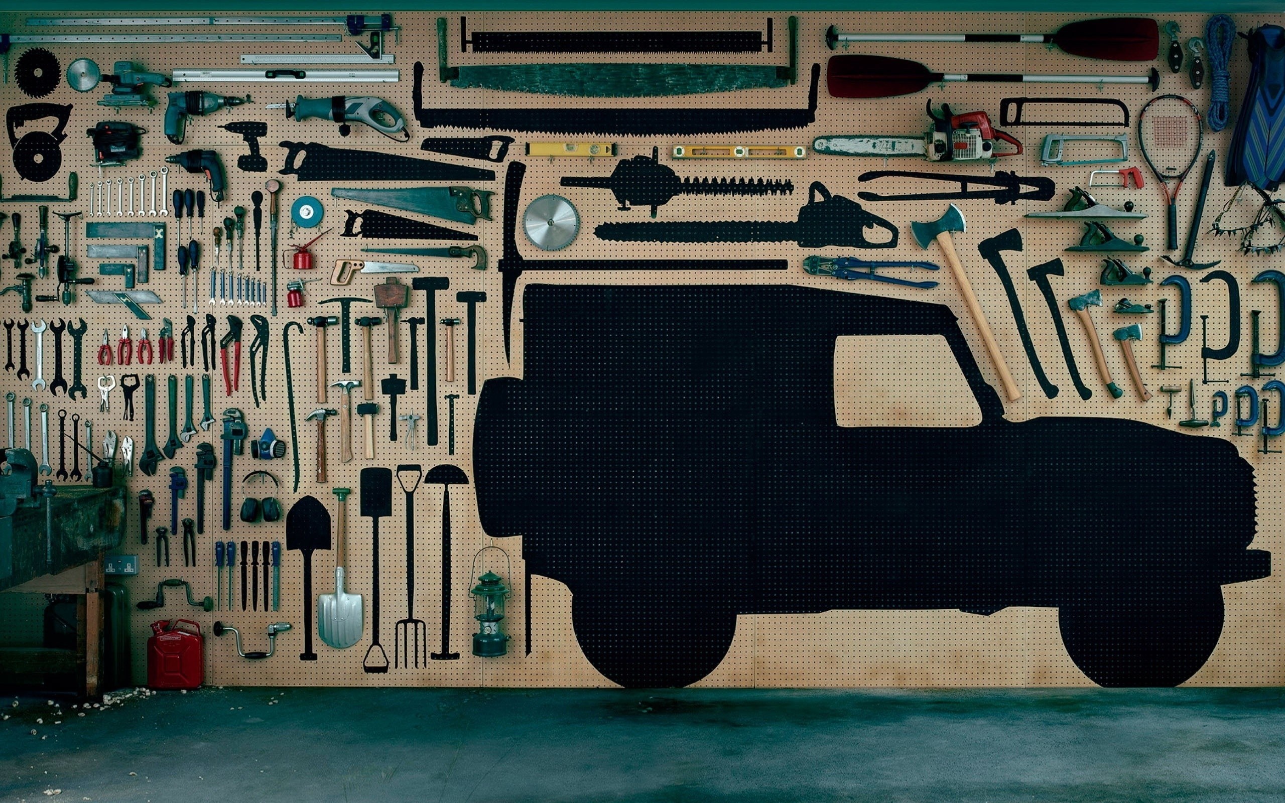 Vehicle silhouette with tools on a pegboard HD Wallpaper