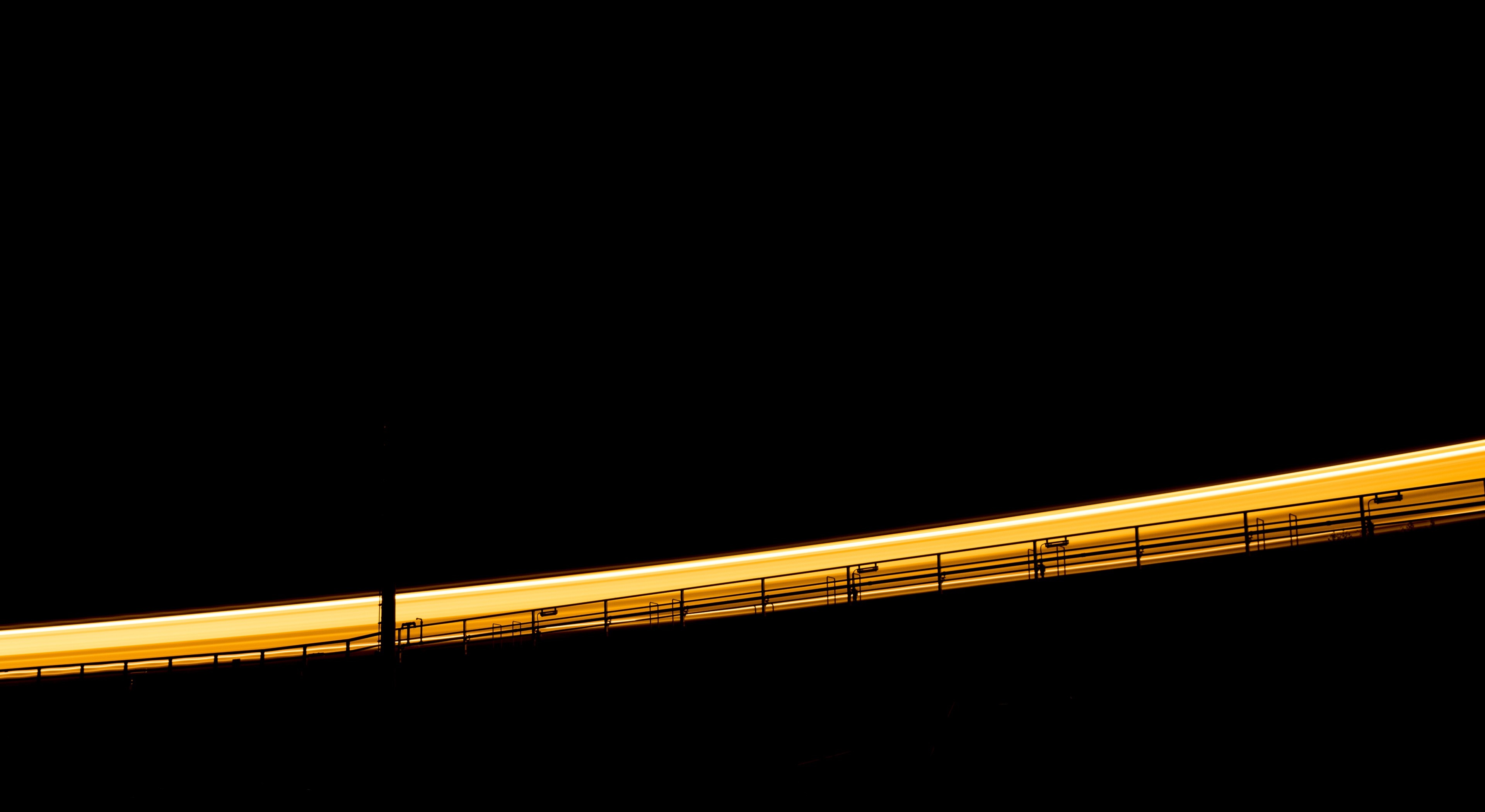 Train light trail at night HD Wallpaper