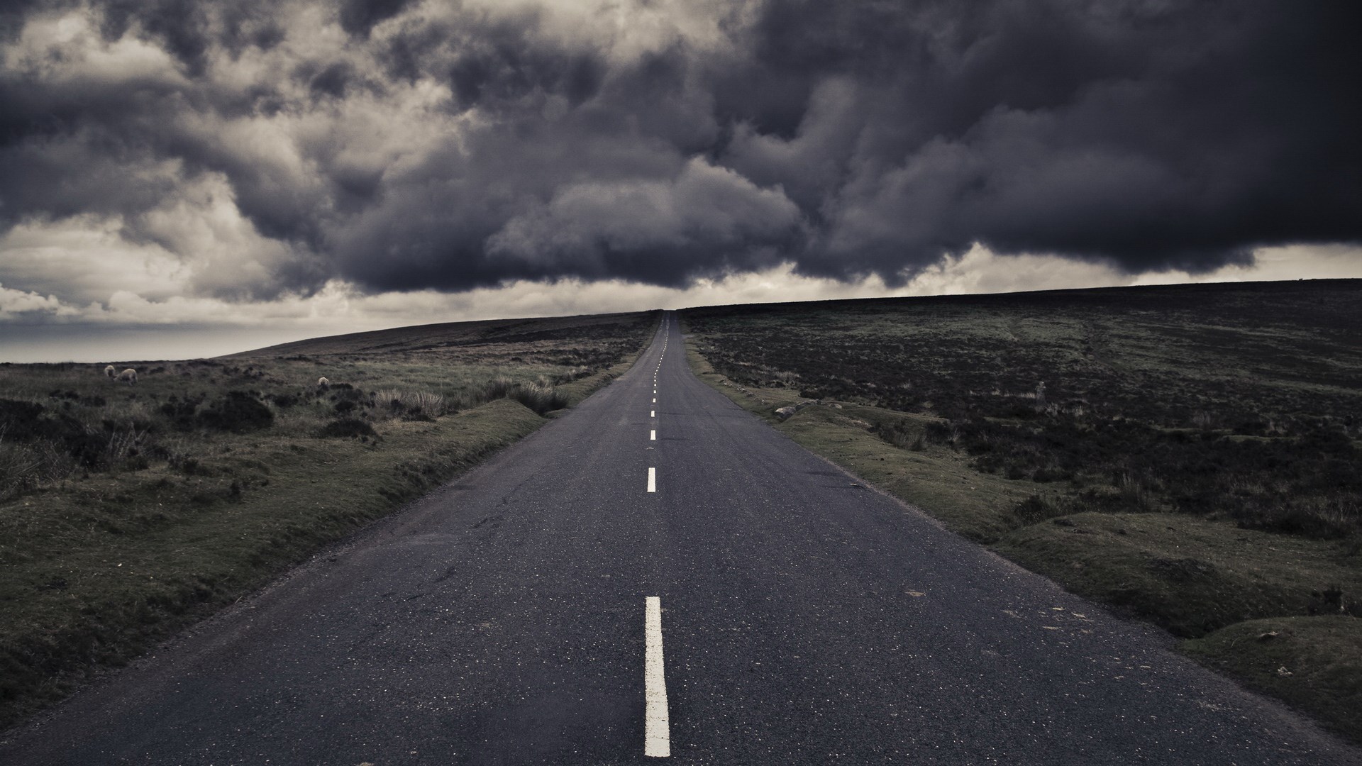 Empty road under stormy clouds HD Wallpaper