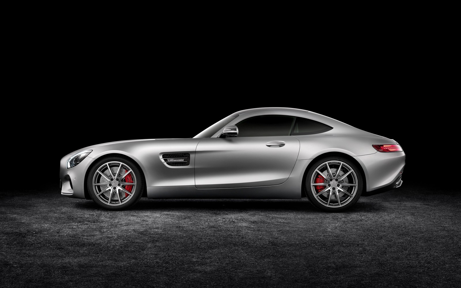 Silver Mercedes-AMG GT sports car on dark background HD Wallpaper