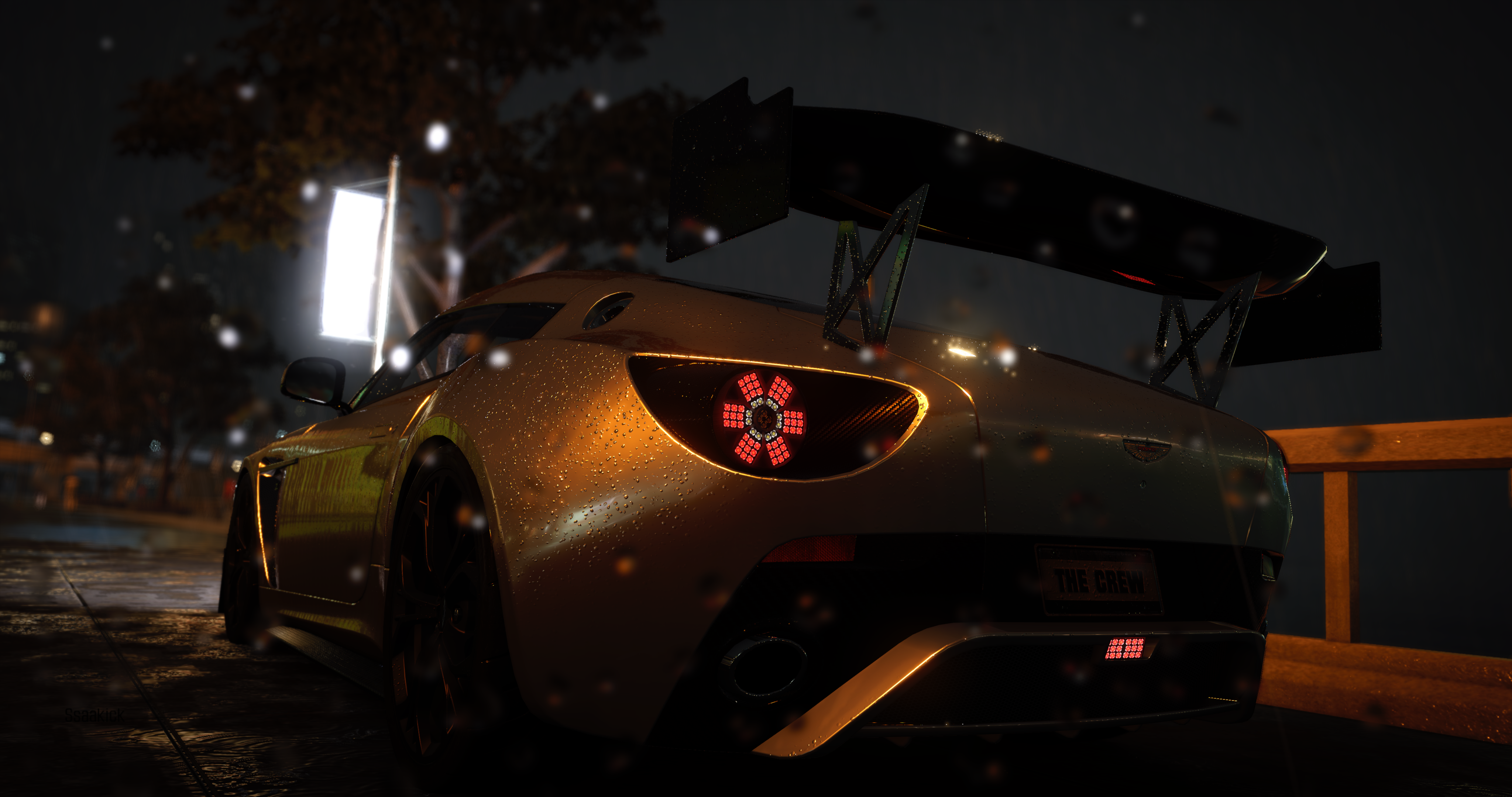 Aston Martin sports car in the rain at night HD Wallpaper