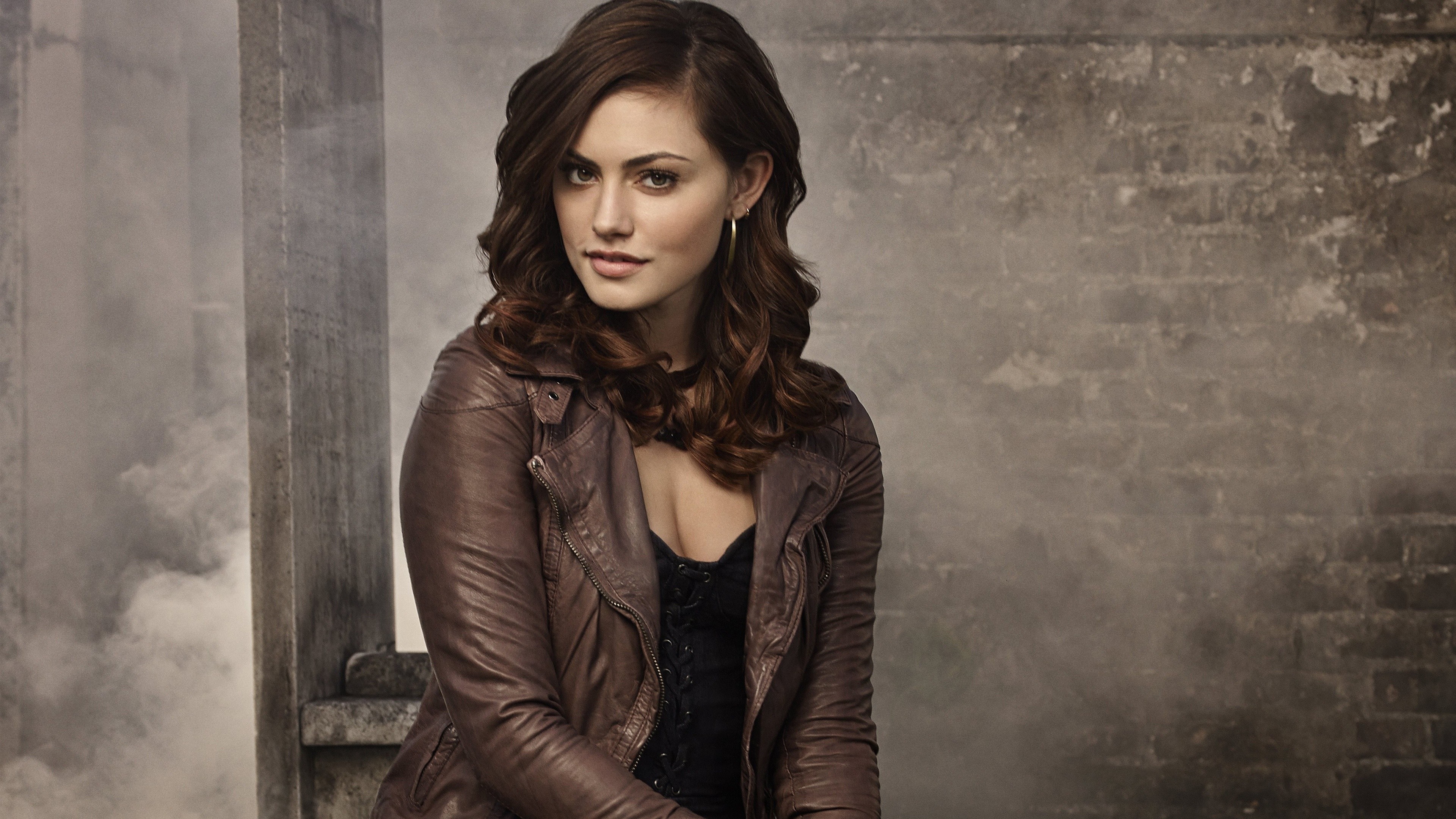 Woman with long brown hair wearing a leather jacket HD Wallpaper
