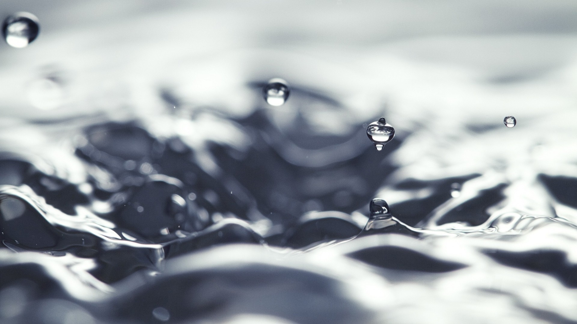 Monochrome macro photography of water drops and ripples HD Wallpaper
