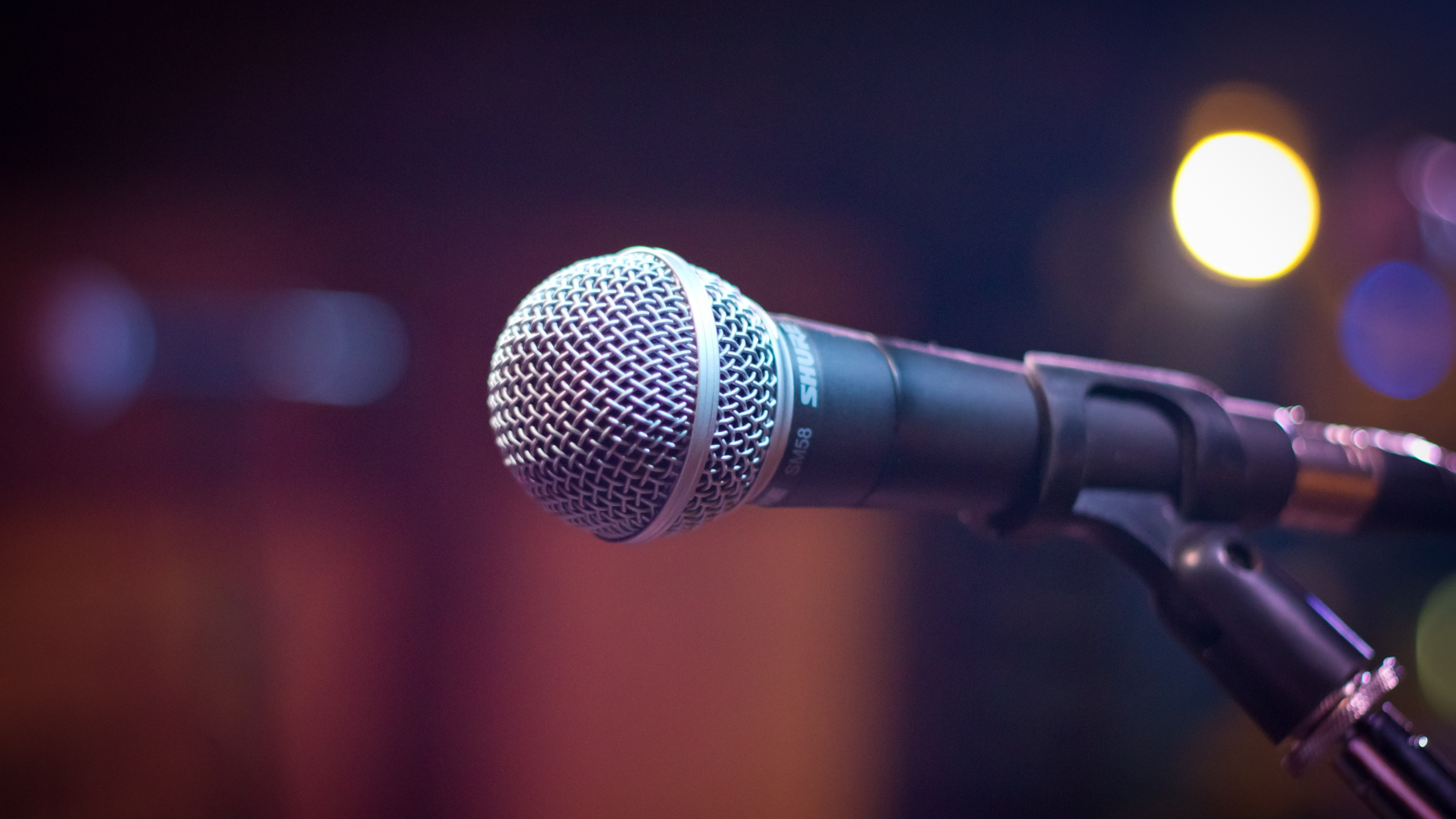Shure SM58 microphone on a stand HD Wallpaper