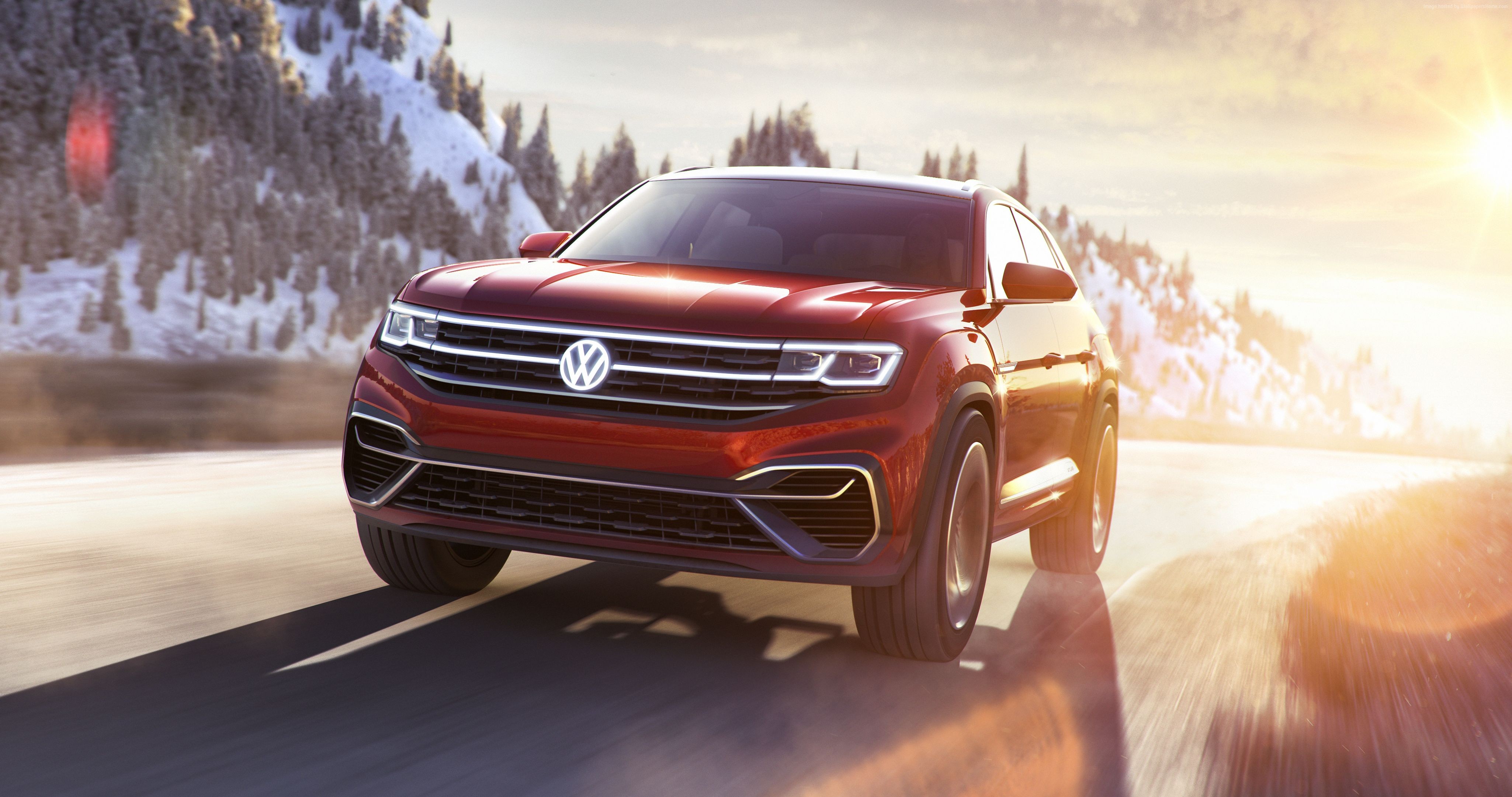Red Volkswagen Atlas Cross Sport SUV driving on snowy road HD Wallpaper