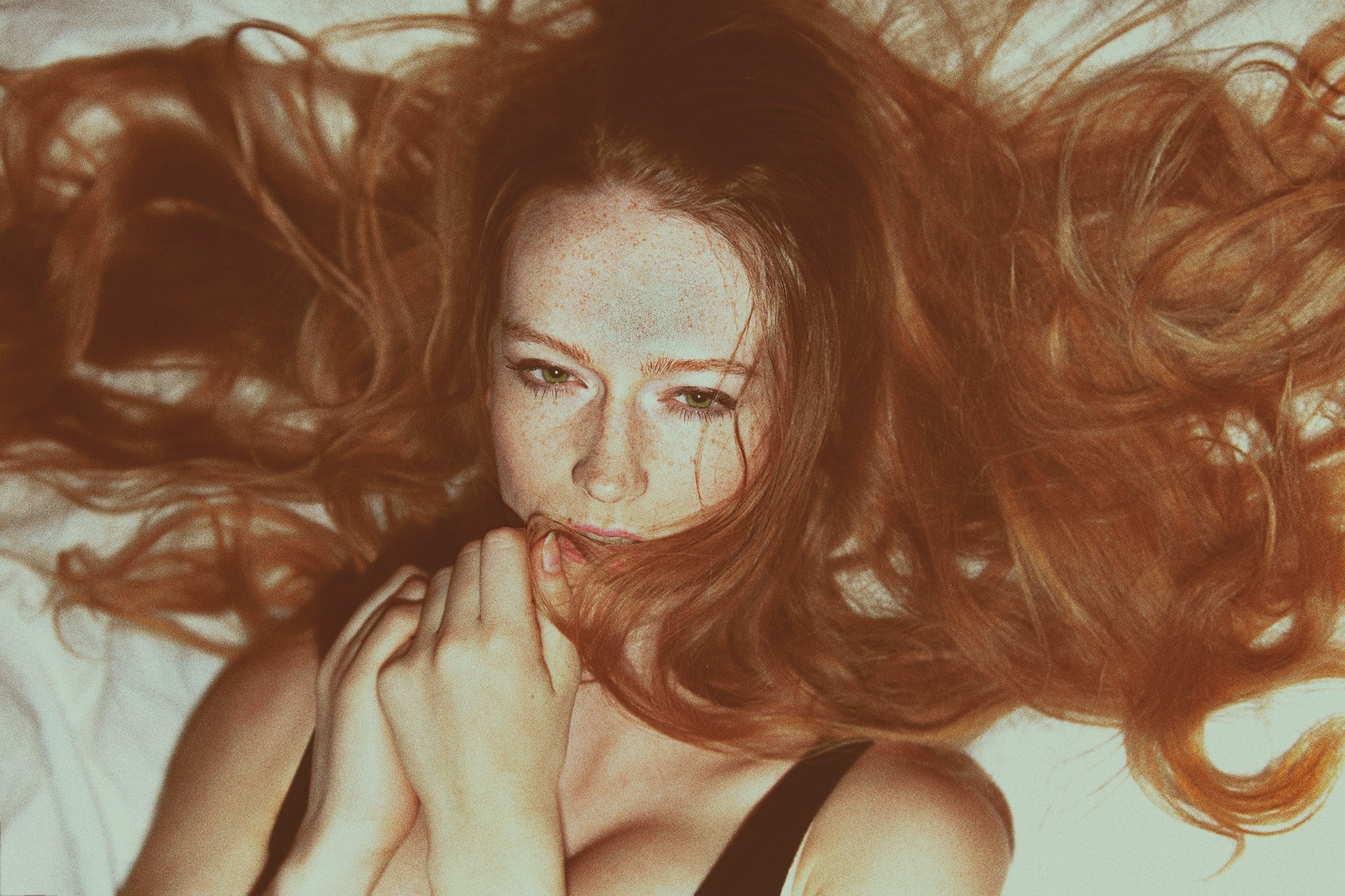 Redhead woman with freckles lying down HD Wallpaper
