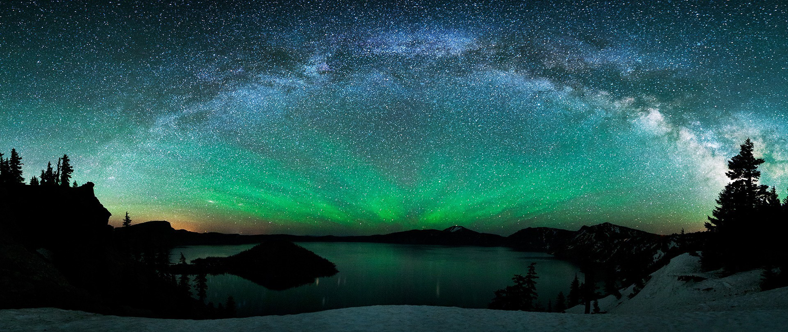 Aurora Borealis over a lake at night HD Wallpaper