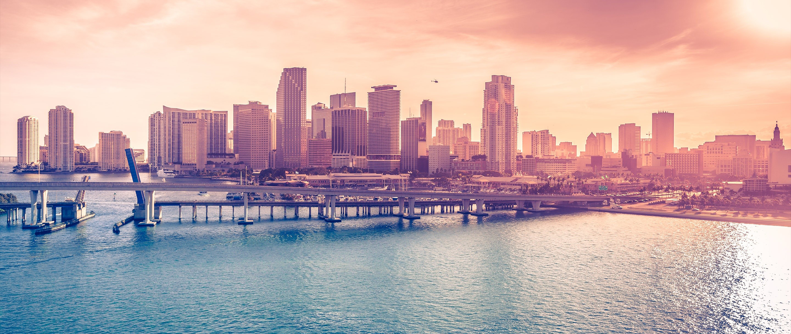 Miami Skyline with Bridge and Water at Sunset HD Wallpaper