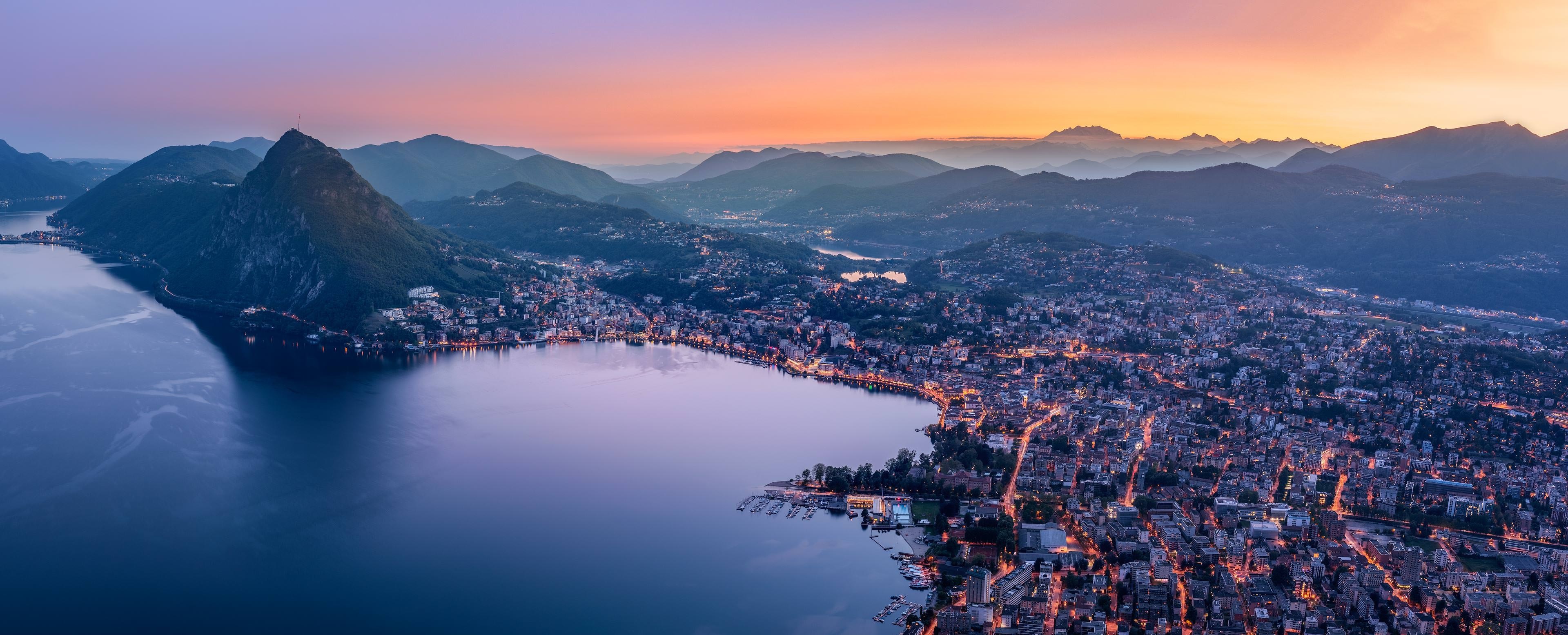 Aerial panorama of Lugano city and lake at sunset HD Wallpaper