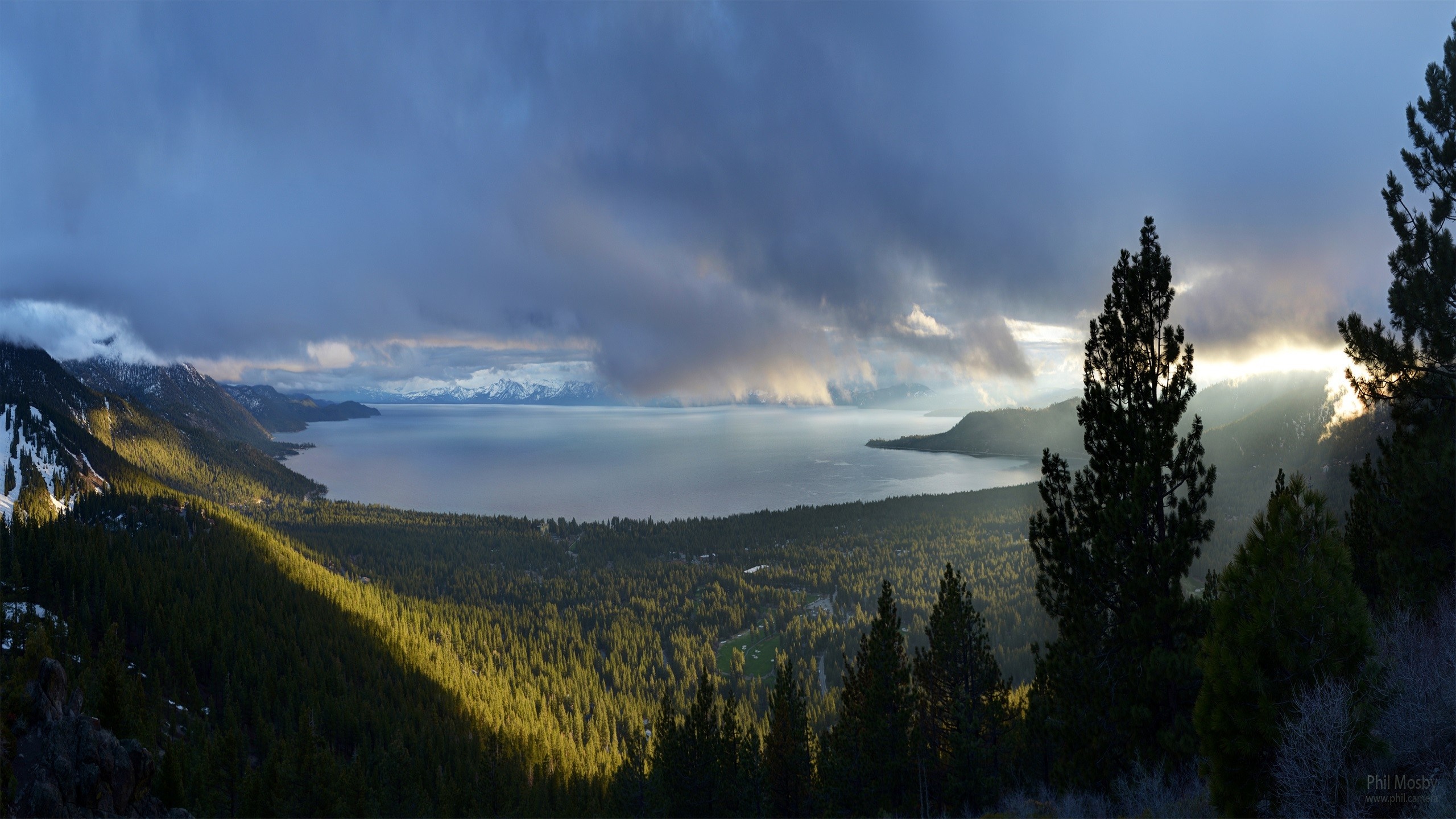Panoramic view of a lake and mountains at sunrise HD Wallpaper