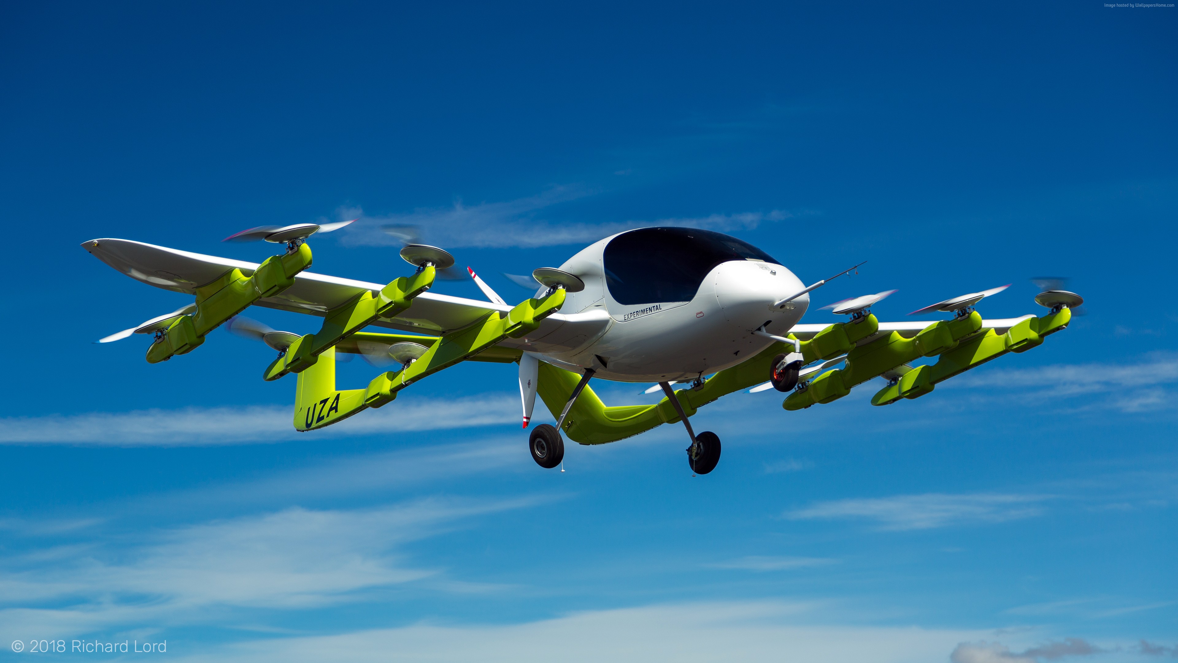 Kitty Hawk Cora aircraft in flight HD Wallpaper