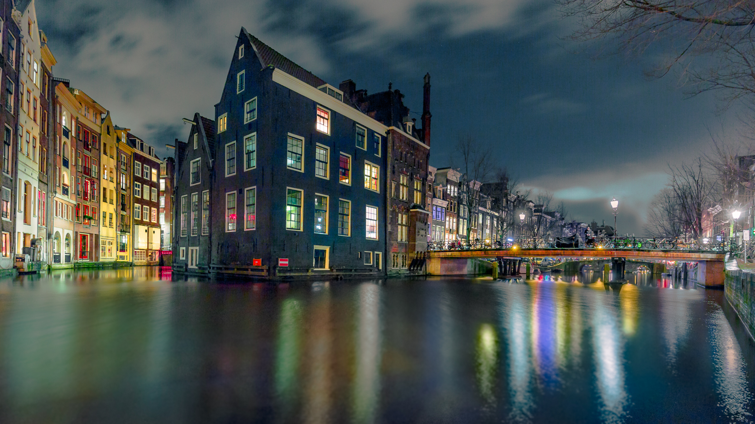 Amsterdam canal at night with reflections HD Wallpaper