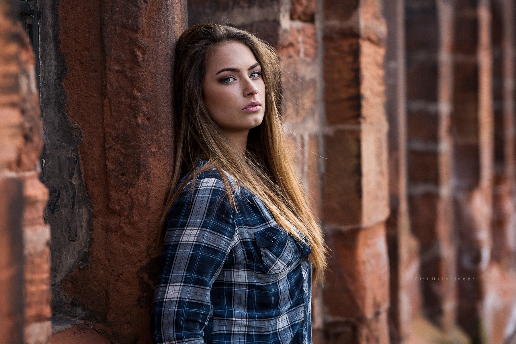Woman with long brown hair wearing a plaid shirt HD Wallpaper