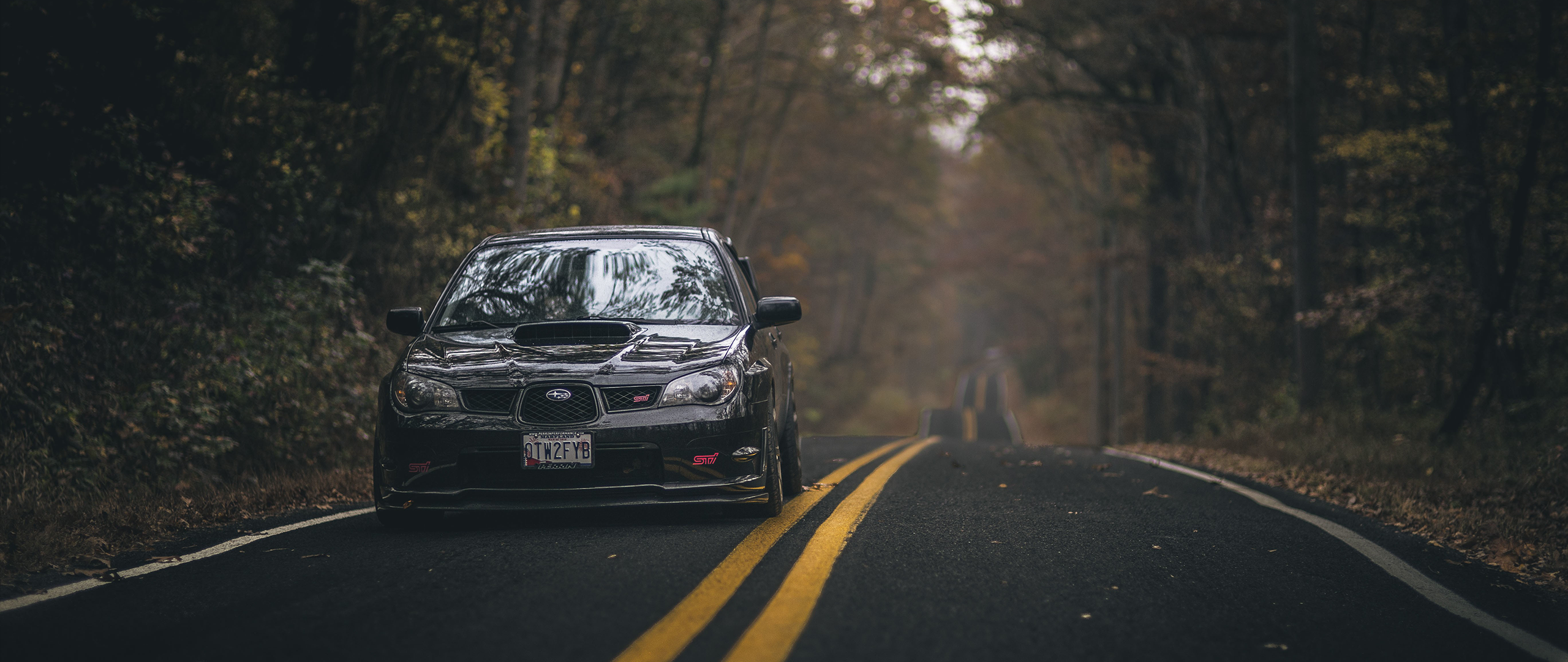 Black Subaru Impreza WRX STI on a forest road HD Wallpaper
