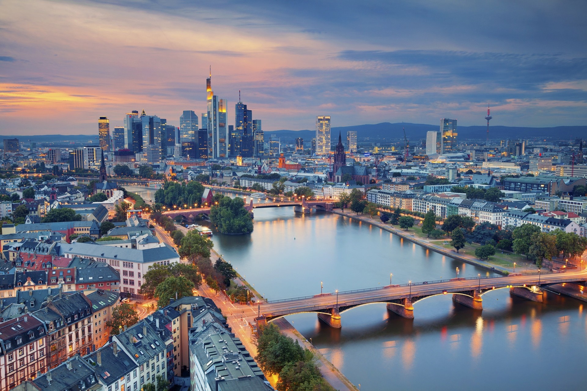 Frankfurt skyline at dusk with river and bridges HD Wallpaper