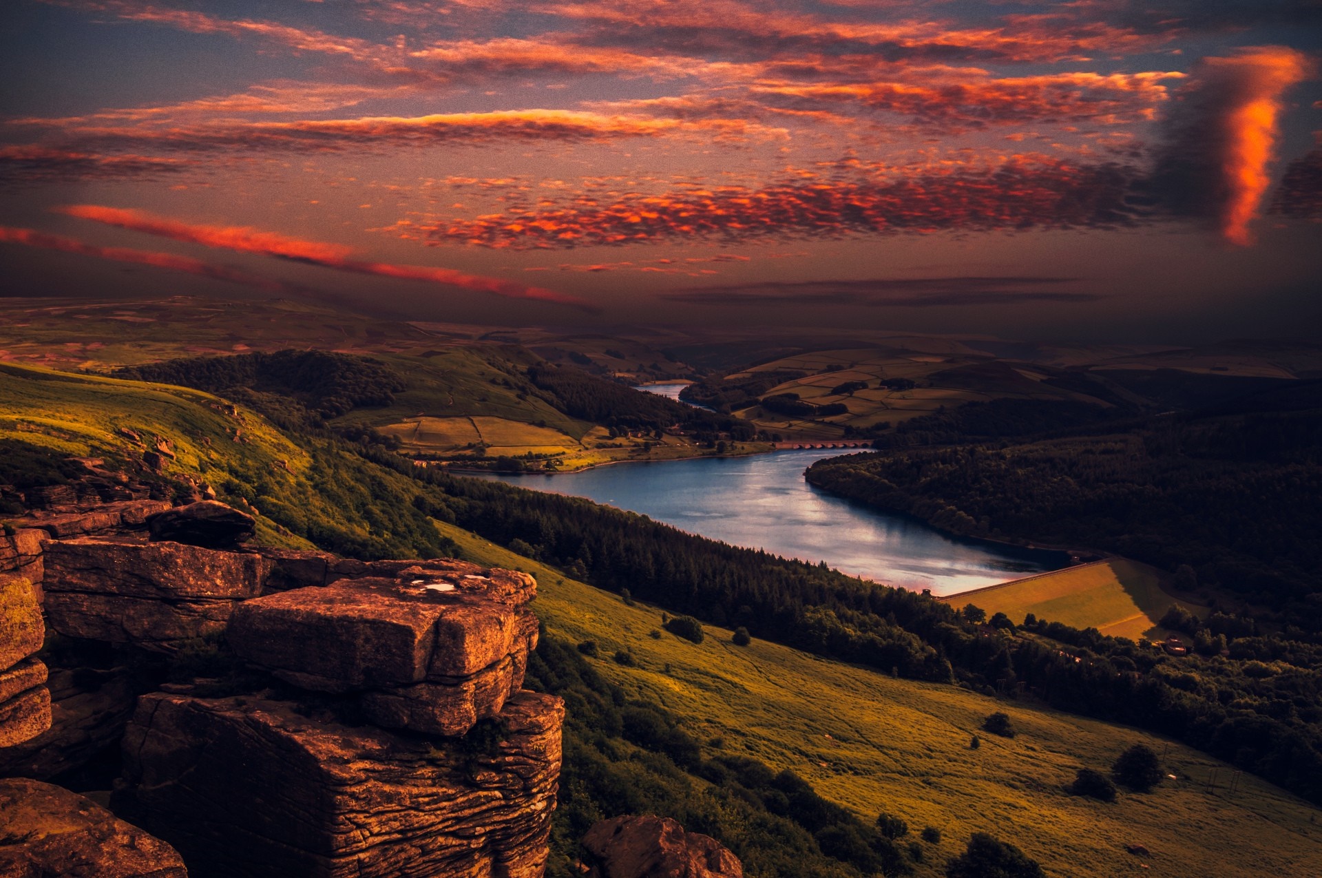 Sunset over a reservoir and rolling hills HD Wallpaper