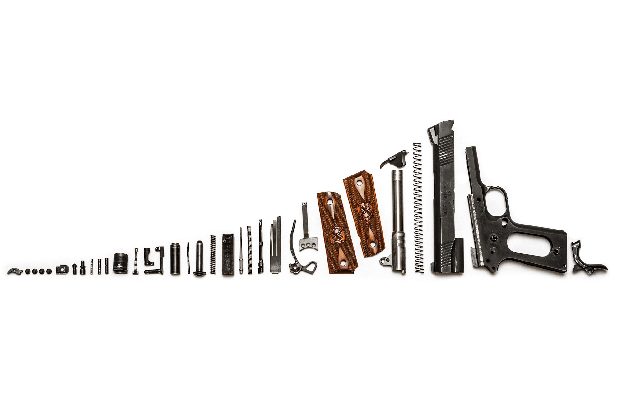 Springfield 1911 pistol disassembled parts HD Wallpaper