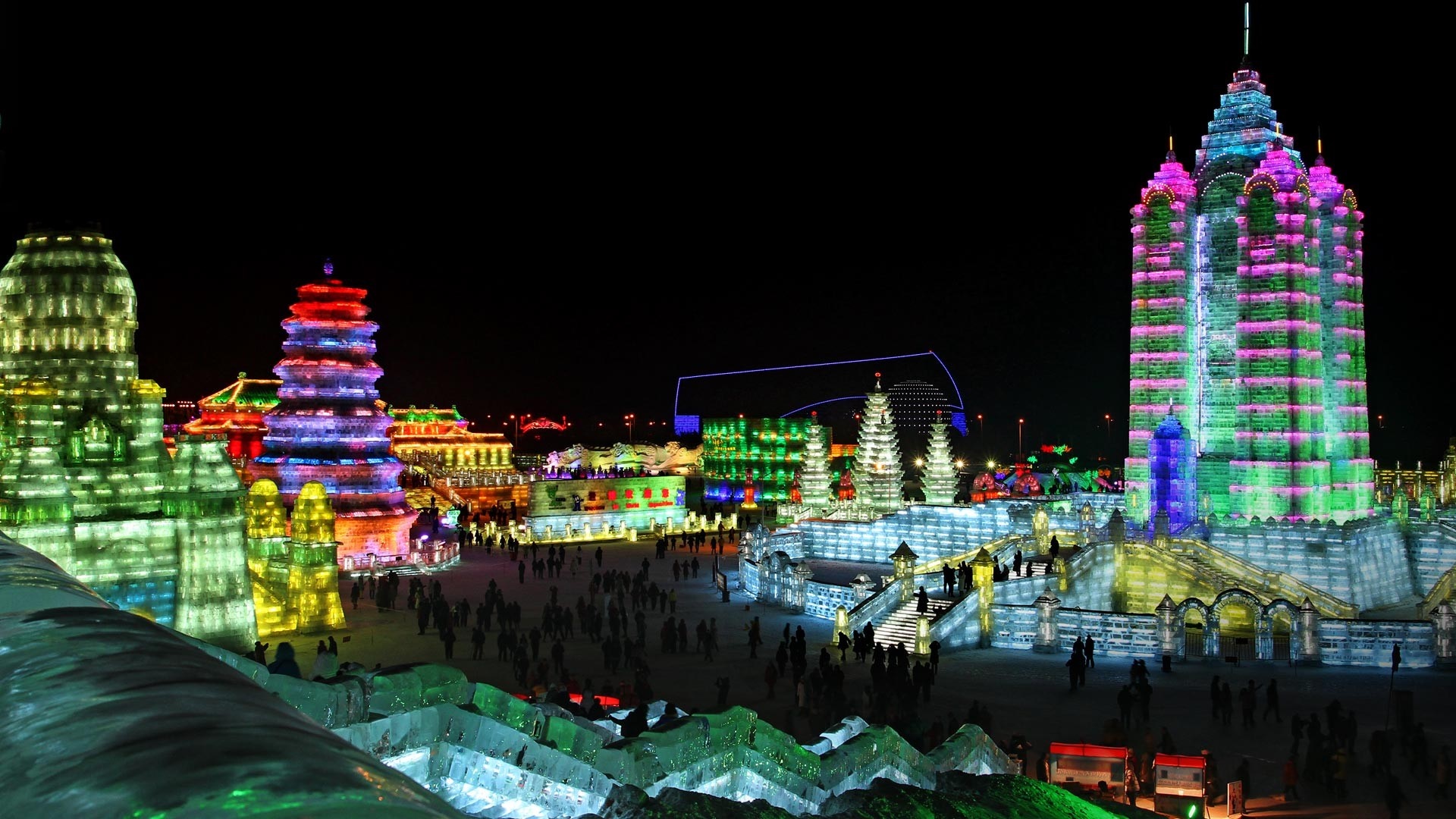 Illuminated ice sculptures at night in China HD Wallpaper