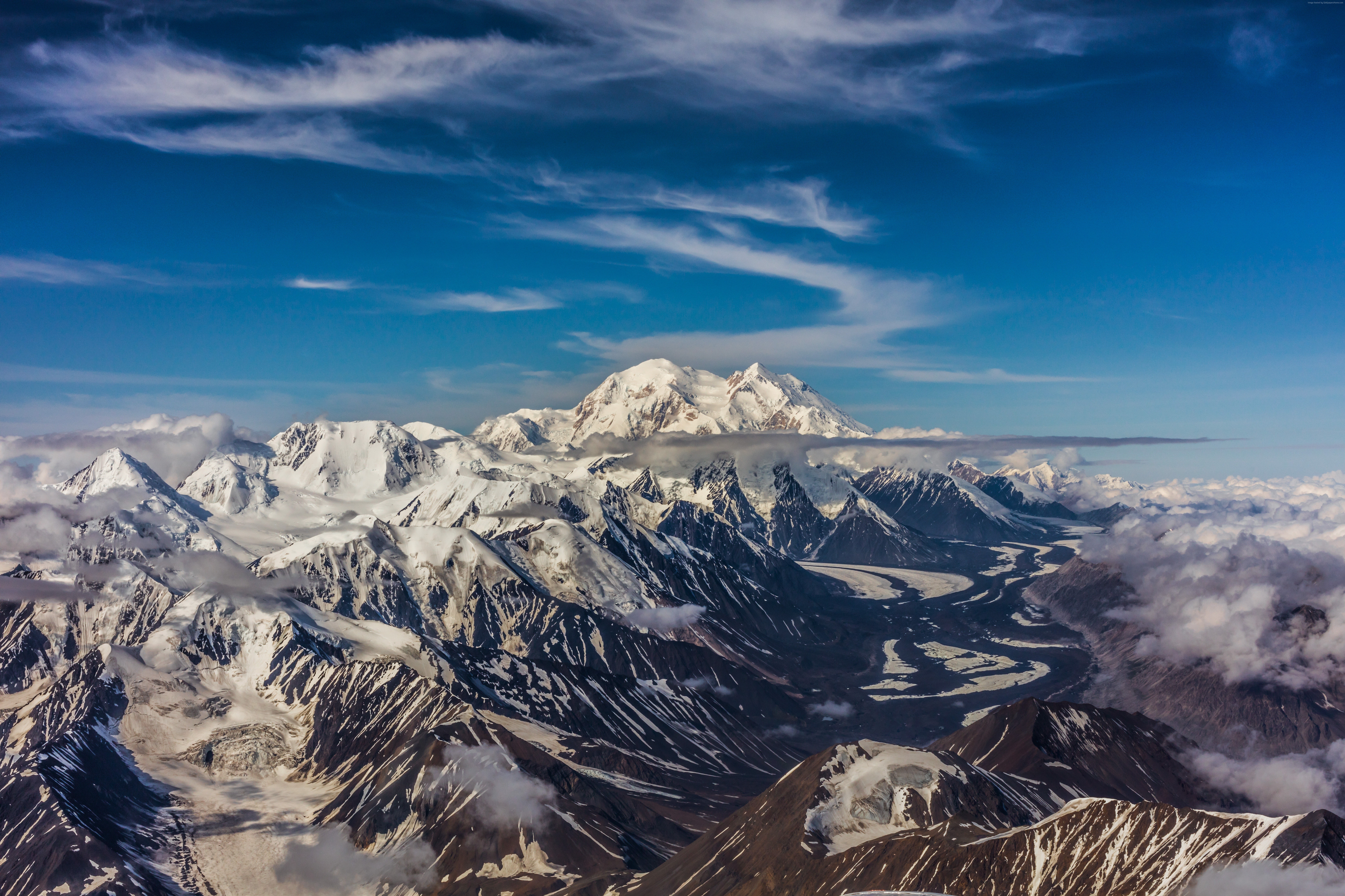 Snow-covered mountains and glaciers under a blue sky HD Wallpaper