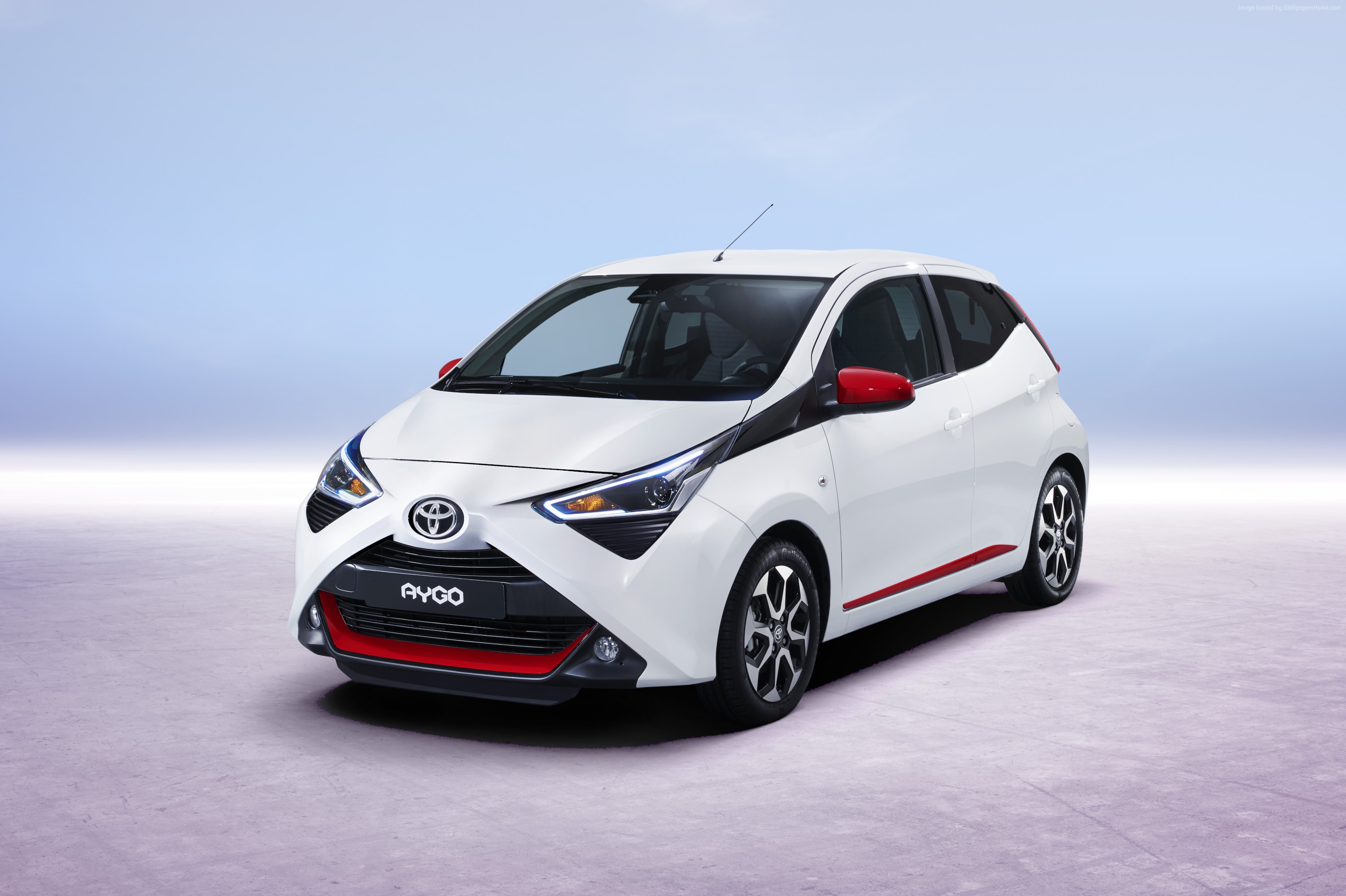 White Toyota Aygo with red accents HD Wallpaper