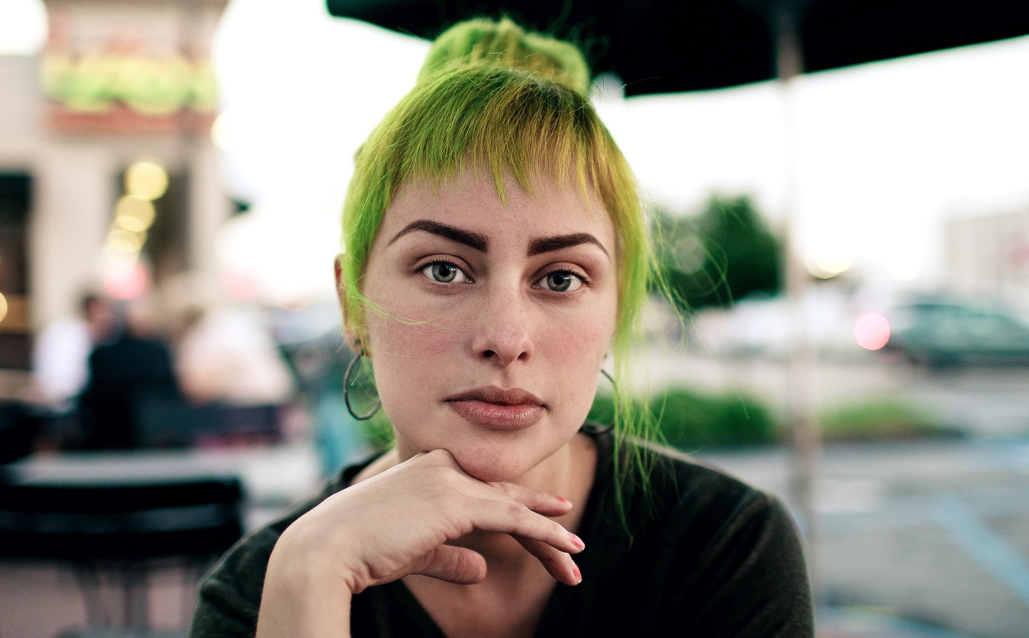 Woman with green dyed hair looking at viewer HD Wallpaper