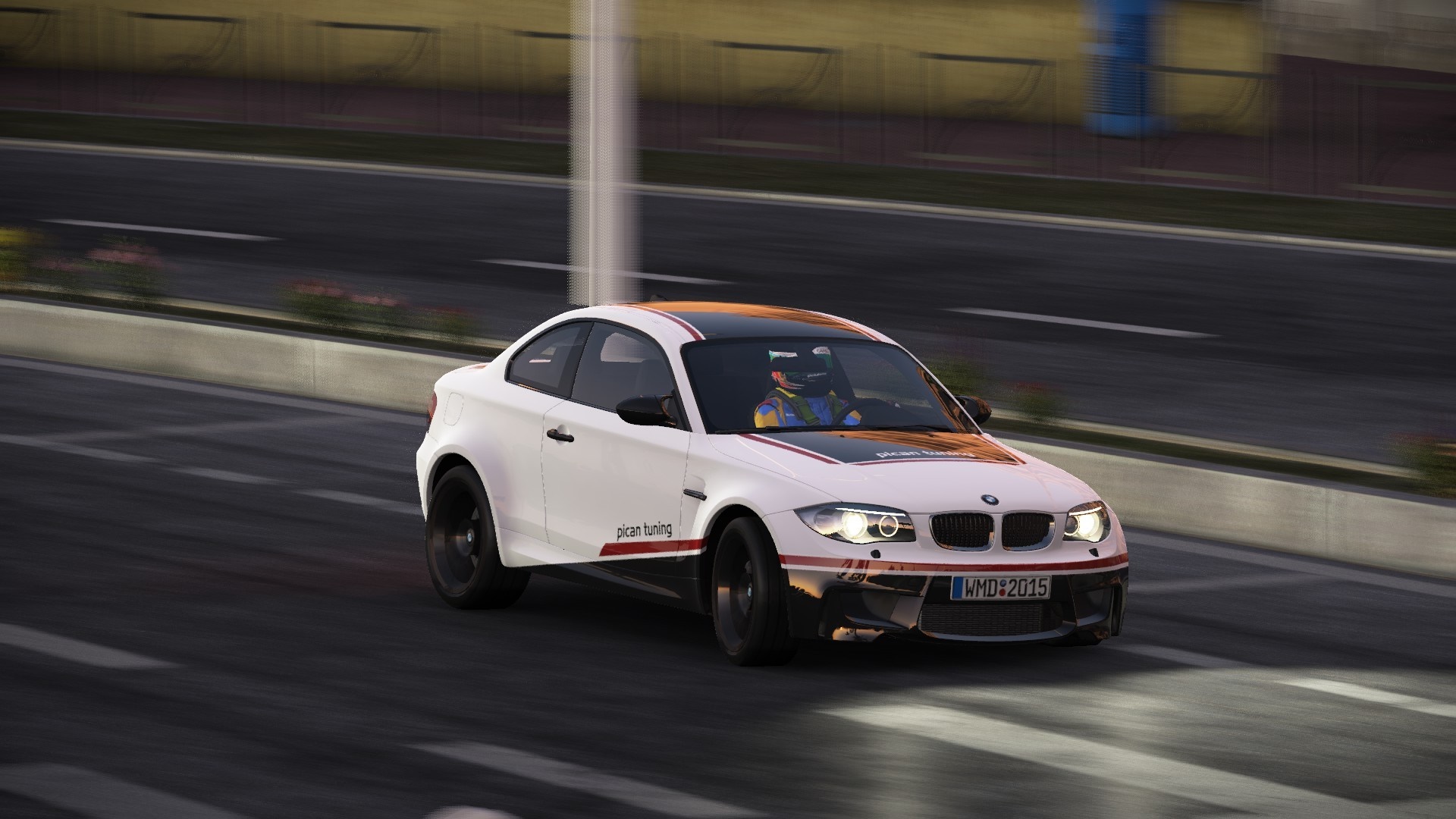 White BMW 1M Coupe on a race track HD Wallpaper