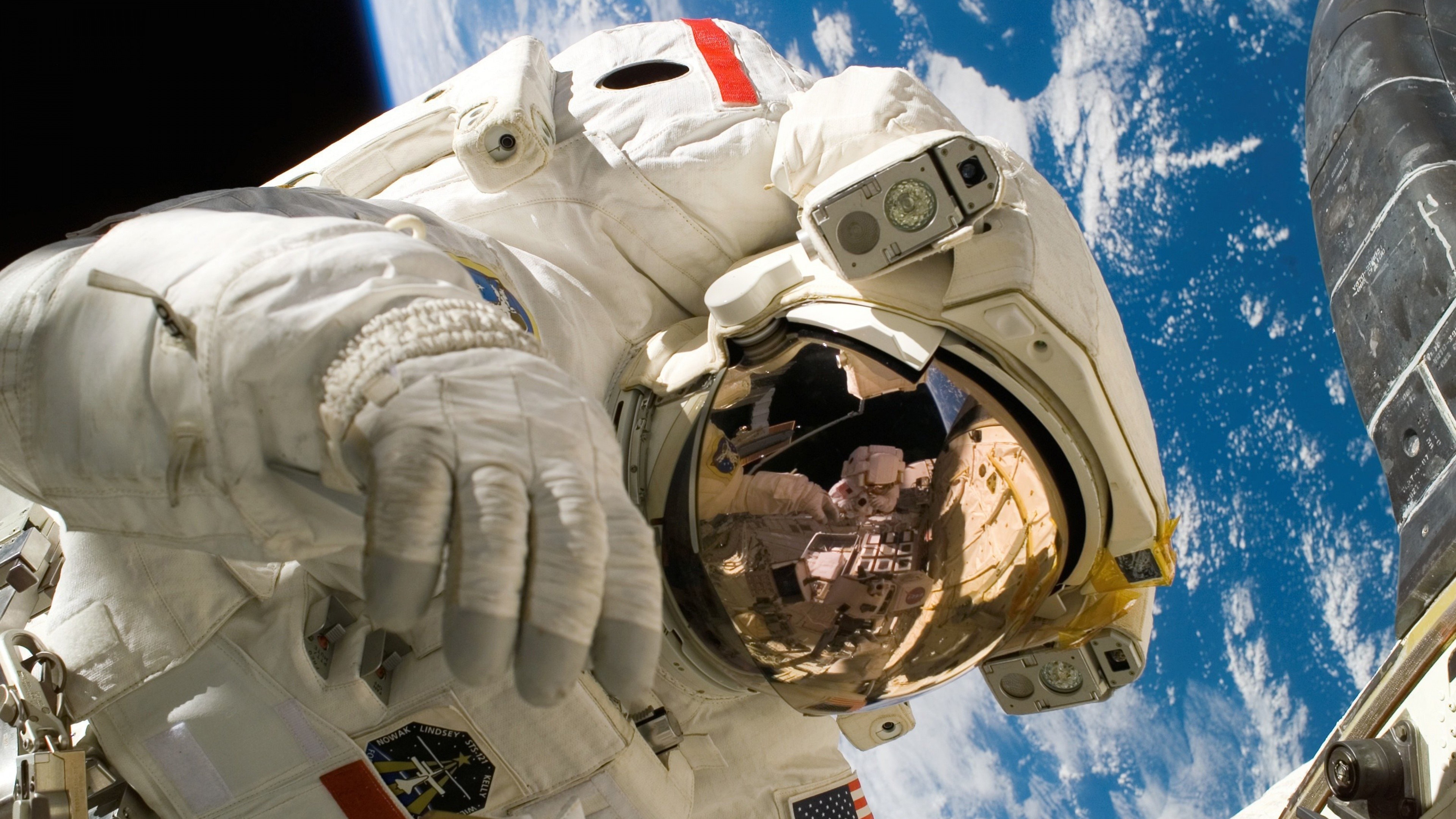 Astronaut on the International Space Station HD Wallpaper