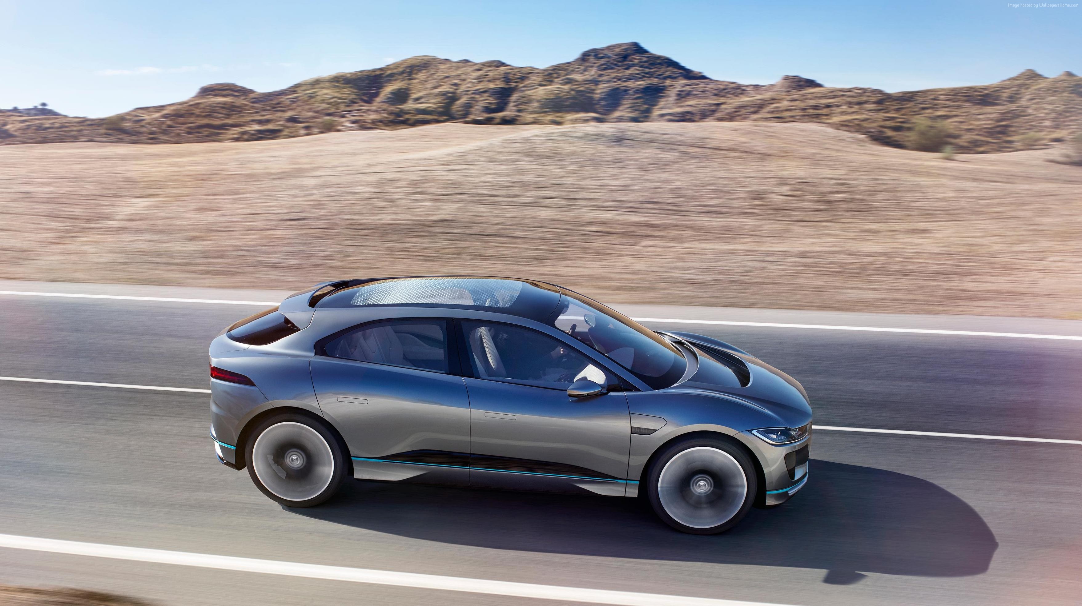 4K Jaguar I-Pace electric car on a road HD Wallpaper