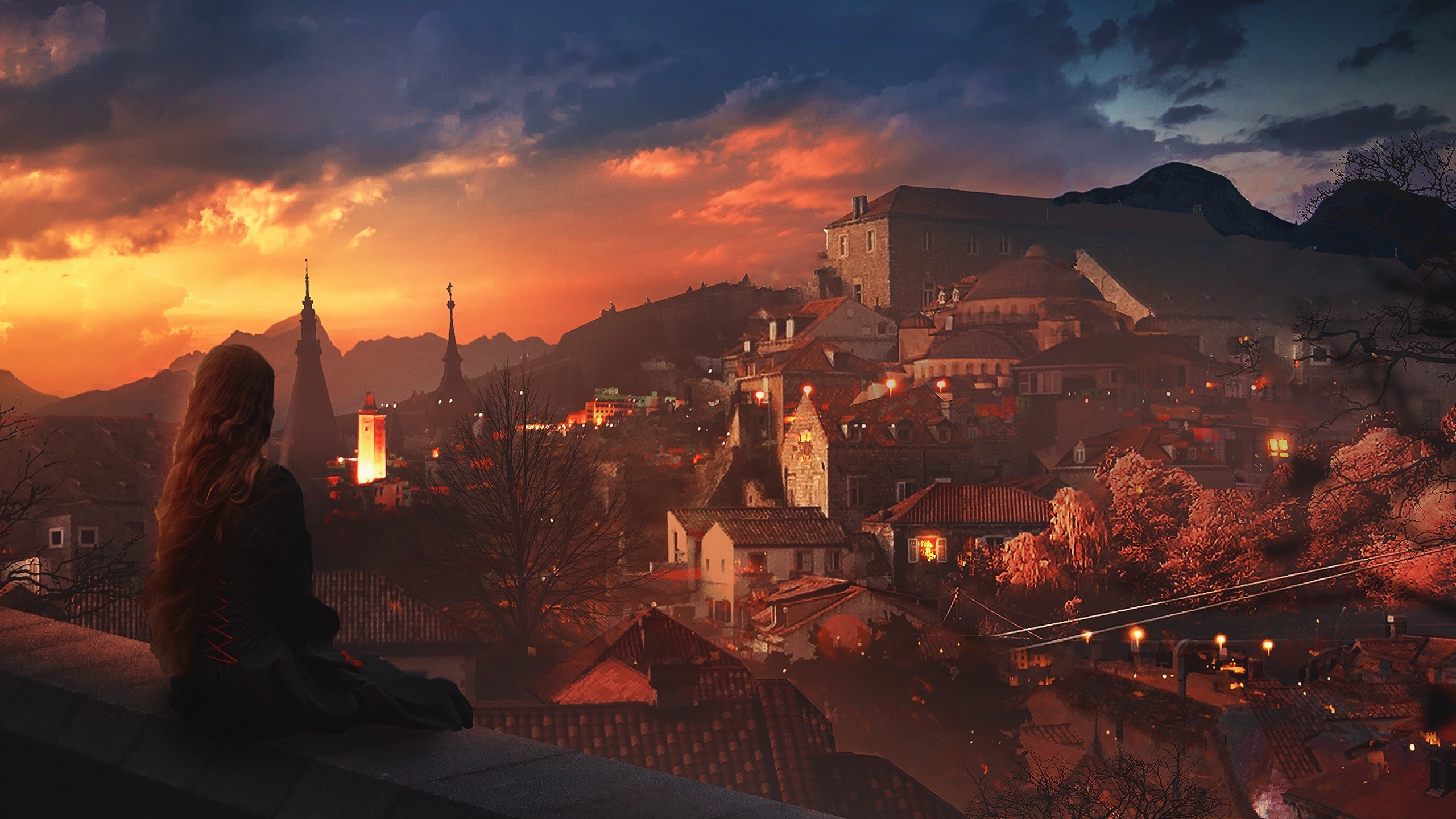 Woman watching a sunset over a European cityscape HD Wallpaper
