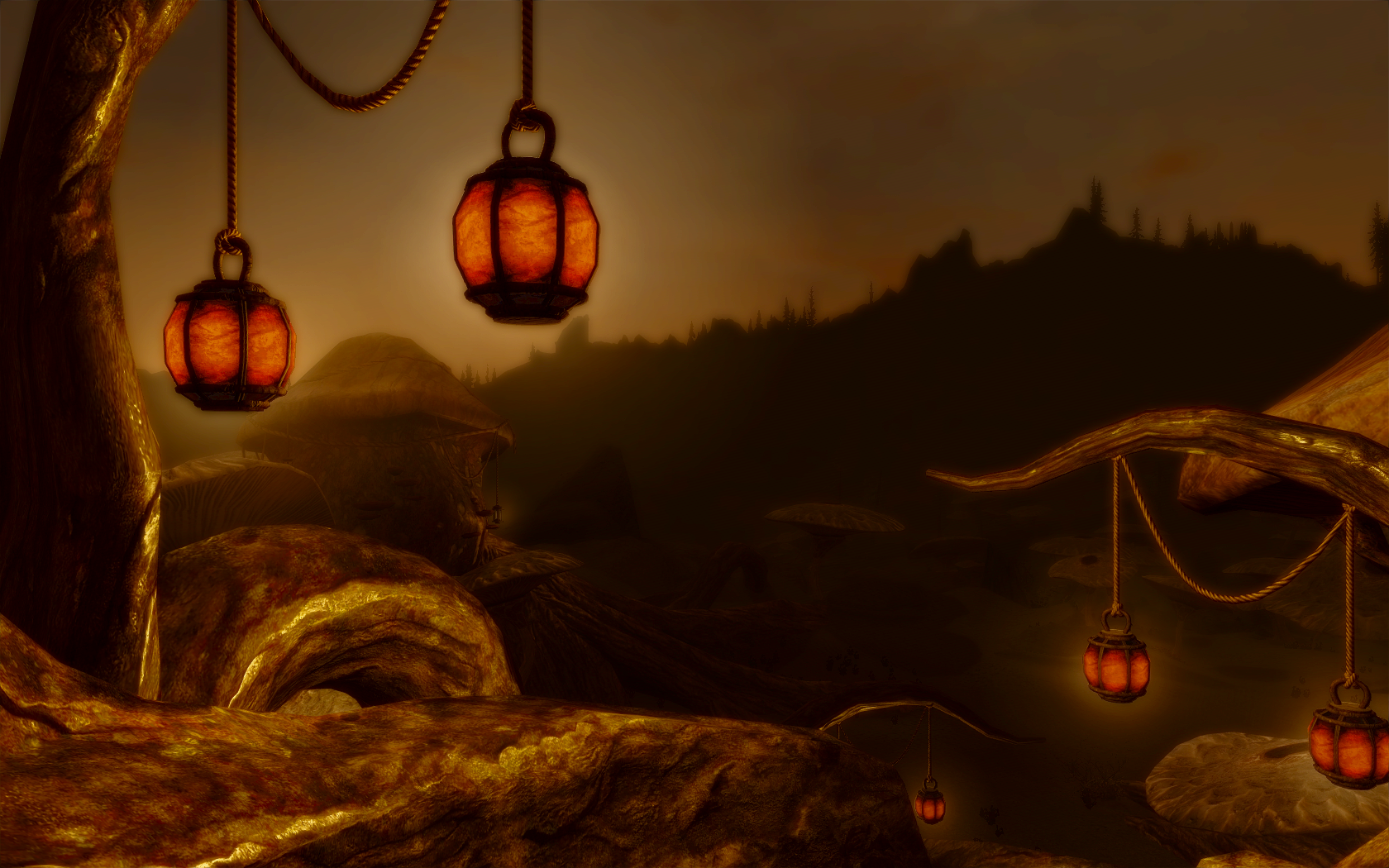 Lanterns hanging in a dark, rocky landscape from The Elder Scrolls V Skyrim HD Wallpaper